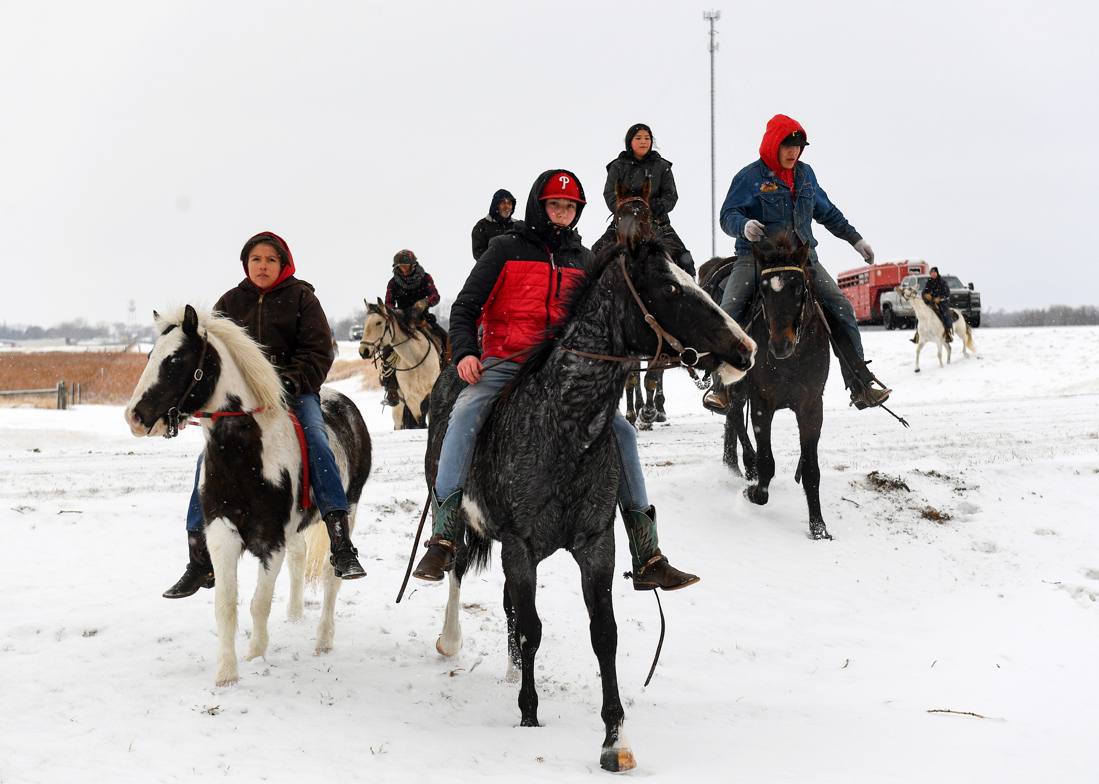 Dakota 38+2 Memorial Riders start their day’s travel from Howard, SD, on Wednesday, December 14, 2022. The horseback journey stretches from the Lower Brule Sioux Tribe to Mankato, MN, commemorating Dakota warriors who died in the largest single-day mass execution in the country on Dec. 26, 1862.