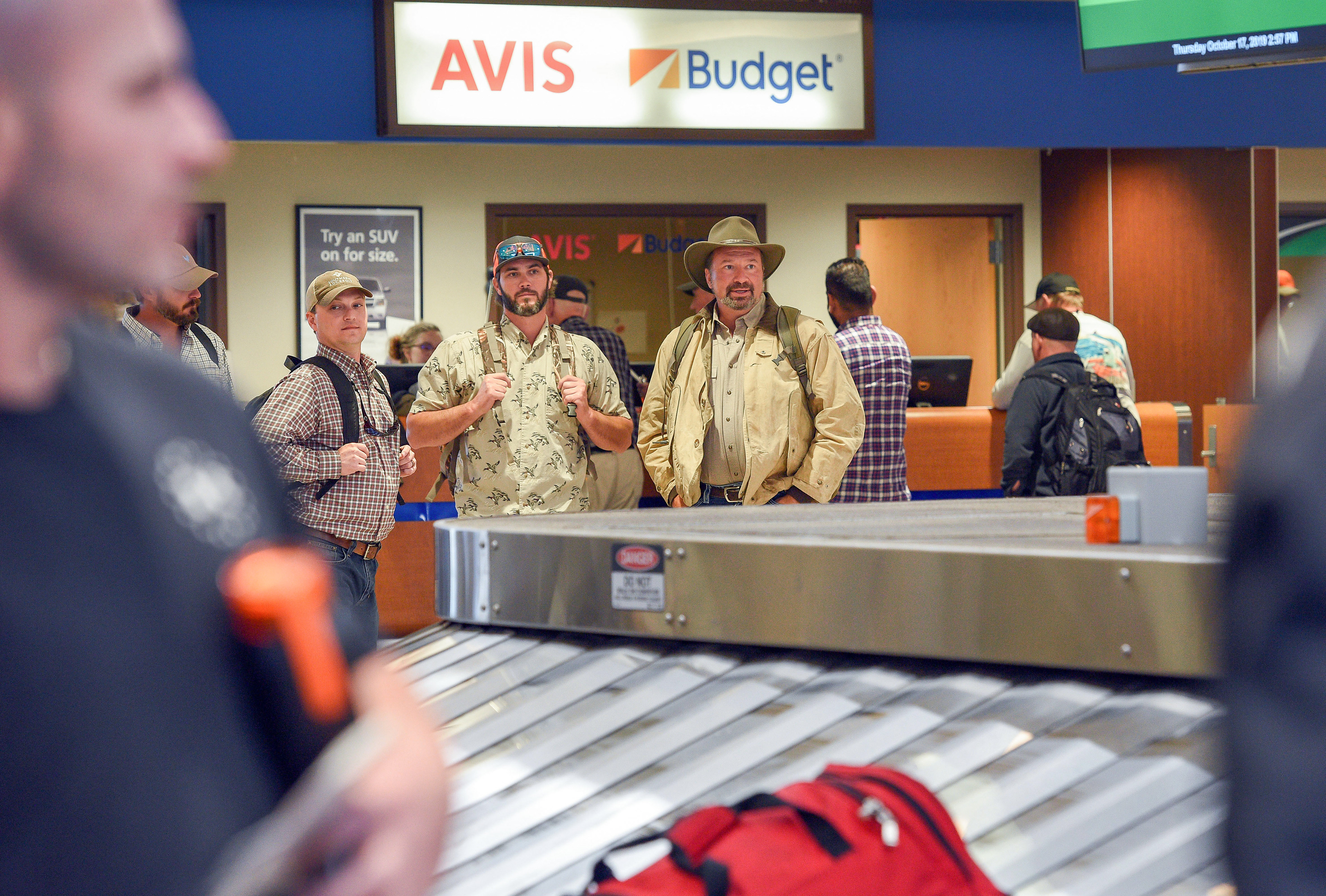 Hunters arrive at the Sioux Falls Regional Airport to take part in the upcoming pheasant hunt on Thursday, October 17, 2019.