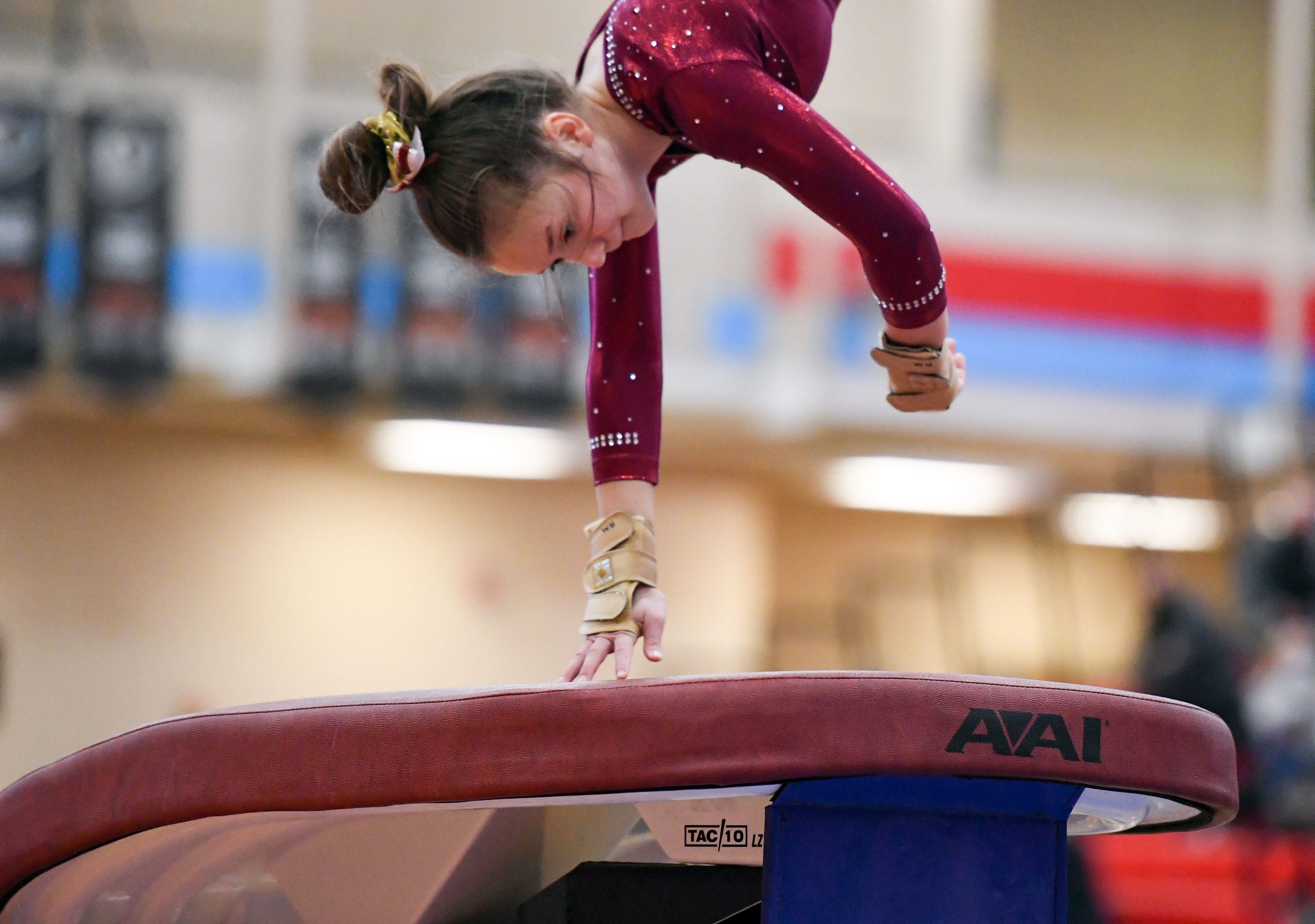 Roosevelt's Anna Matrisciano performs a handspring halfway in a gymnastics meet on Saturday, Jan. 30, 2021, at Lincoln High School in Sioux Falls.