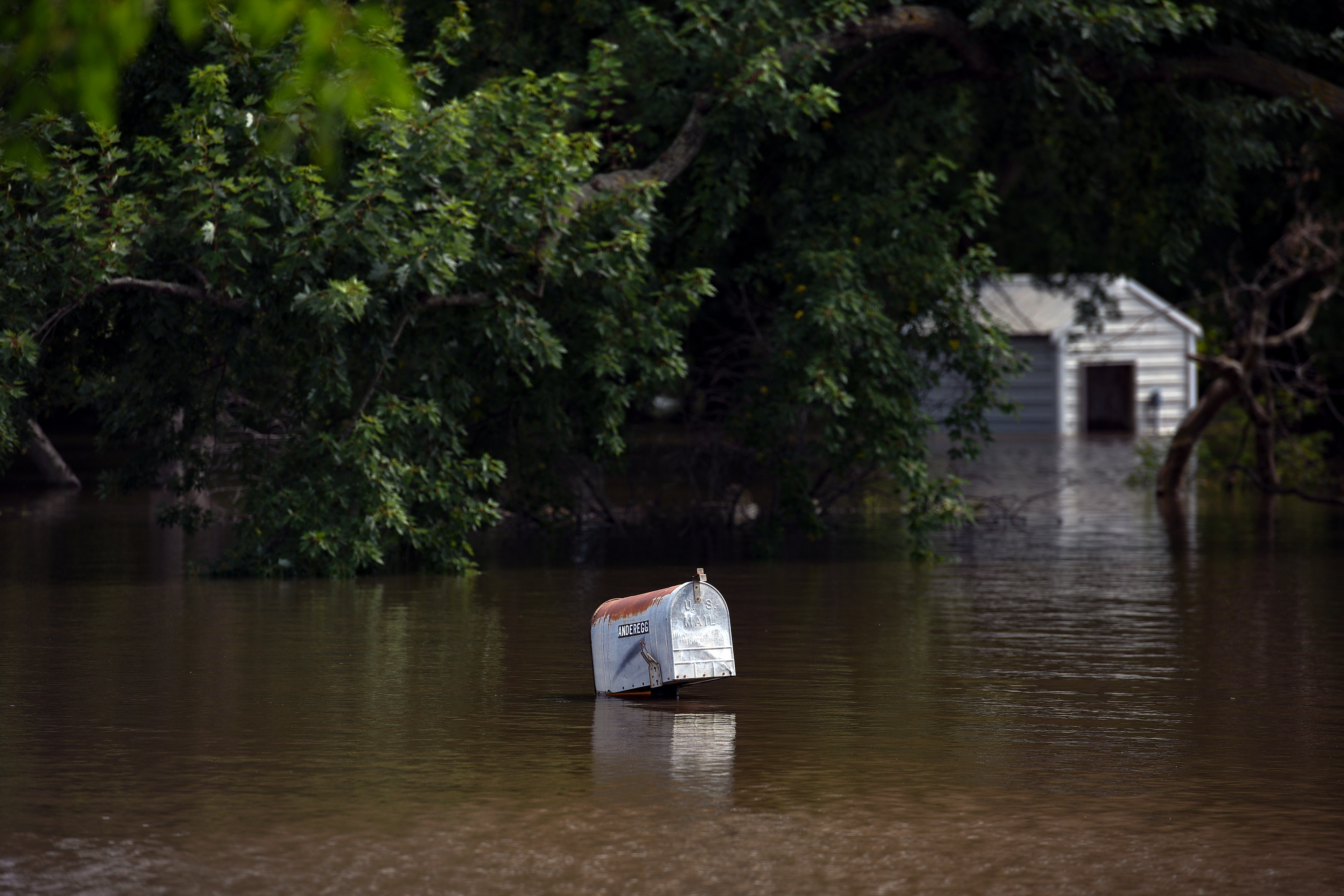 Residents of Dell Rapids, SD, deal with massive flooding after severe storms in the area on Friday, September 13, 2019.