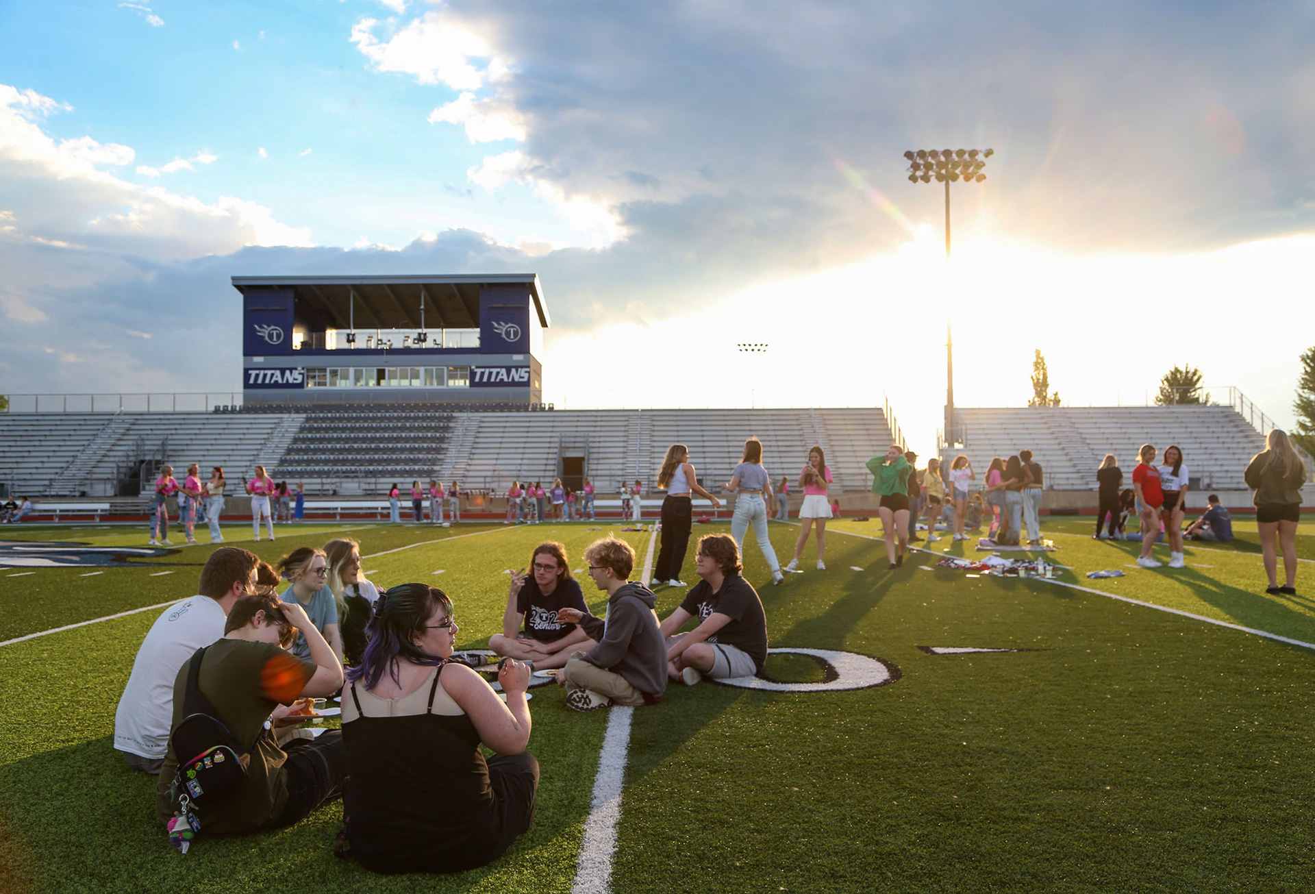 Lee’s Summit West High School seniors gather on the football field on May 14, 2024, for one last class party before graduation.