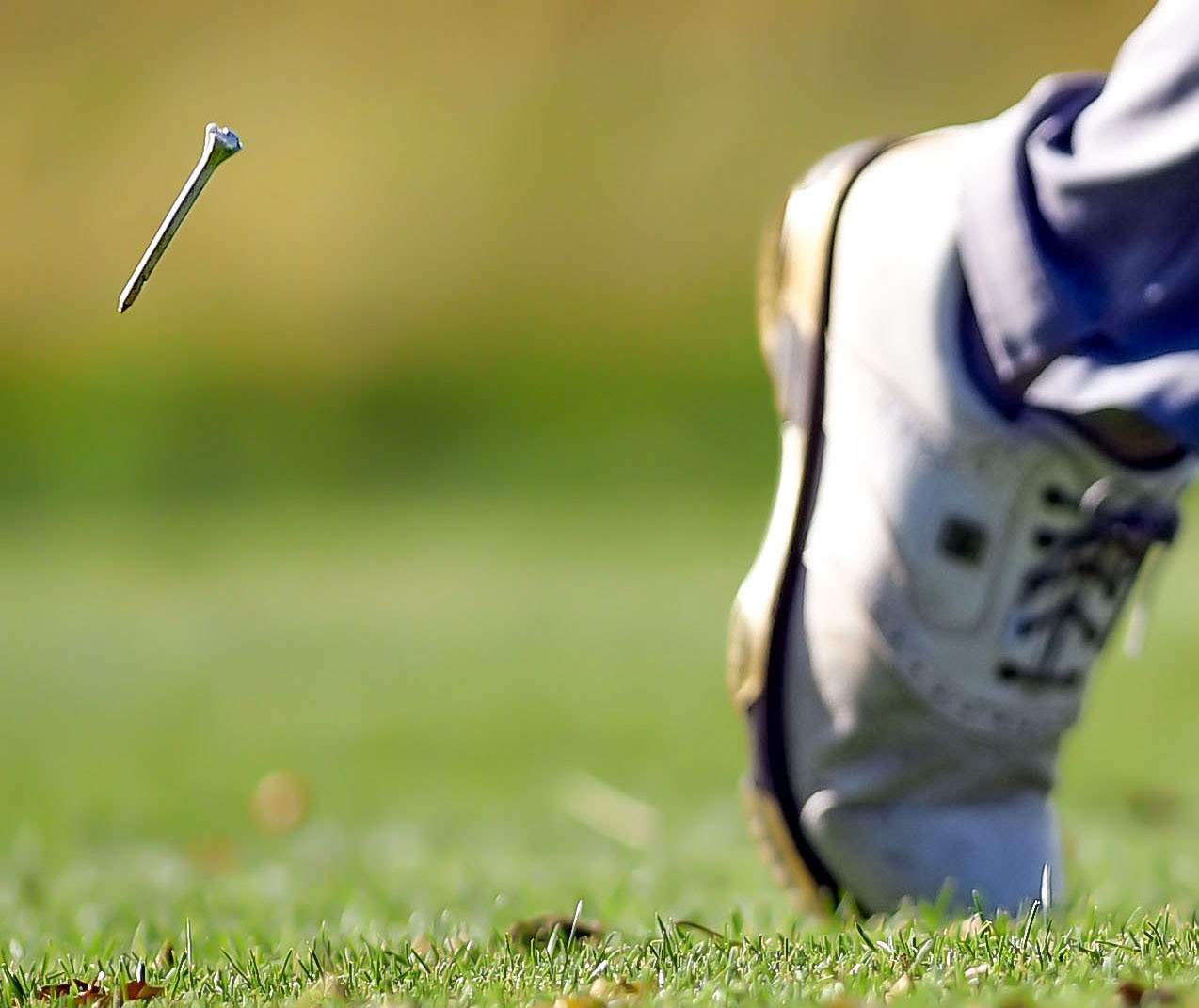 A golfer's tee flips into the air after being hit during the final round of the Boys City Golf meet on Tuesday, September 24, 2019, at Elmwood Golf Course in Sioux Falls.