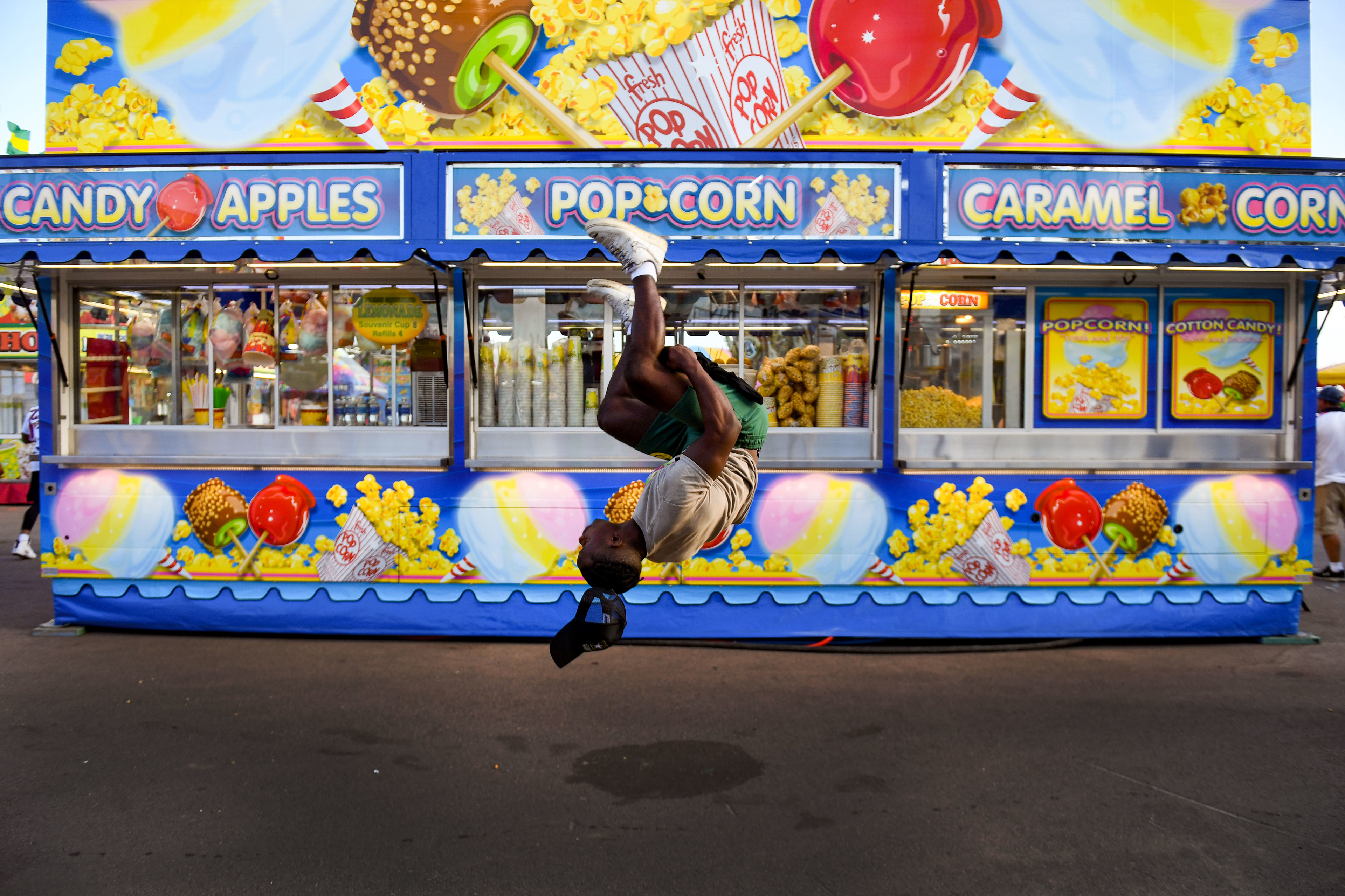Giles Nitunga shows off a backflip at the Sioux Empire Fair on Friday, August 5, 2022, at the W.H. Lyon Fairgrounds in Sioux Falls.