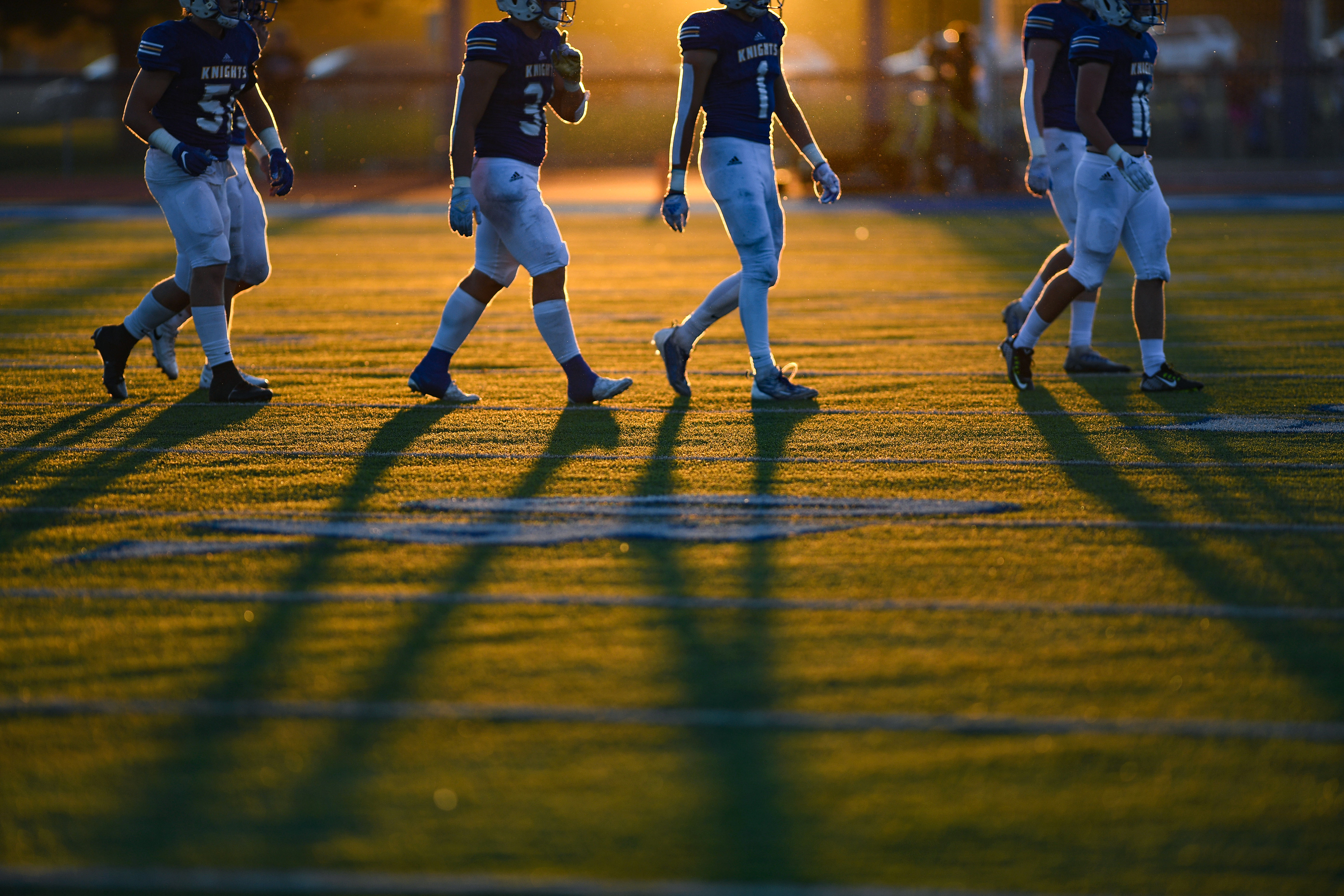 O’Gorman football players walk off the field between quarters on Friday, September 2, 2022, at O’Gorman High School.