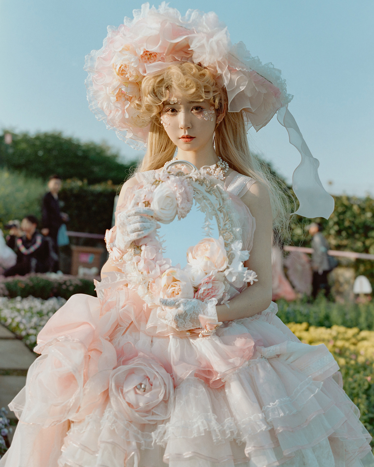 Luo He, 2024. Luo He is a Lolita handcraftwomen. In the process of commercialization of the Lolita subculture community, a variety of creative industry occupations have arisen, and one of them is the handcraftwomen. They emphasize their subcultural identity by making handmade accessories to enrich their Lolita-style outfit. The hat and the mirror are both of her own design.