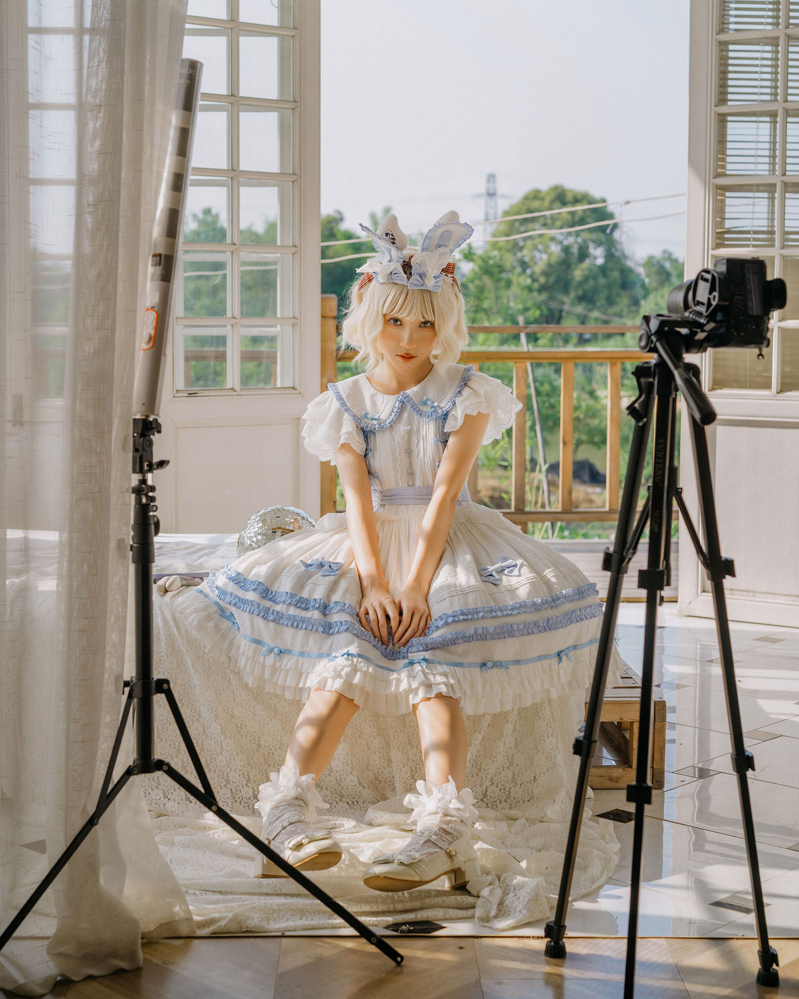 Wan Rui. WanRui fell in love with the Lolita subculture almost ten years ago. She believes that Lolita gives her self-confidence and happiness and can help her overcome her social phobia. She is now a Lolita model and an independent photographer. She usually sets up her camera on a tripod, takes self-portrait using a mobile app and then shares her Lolita photos on social media platforms.