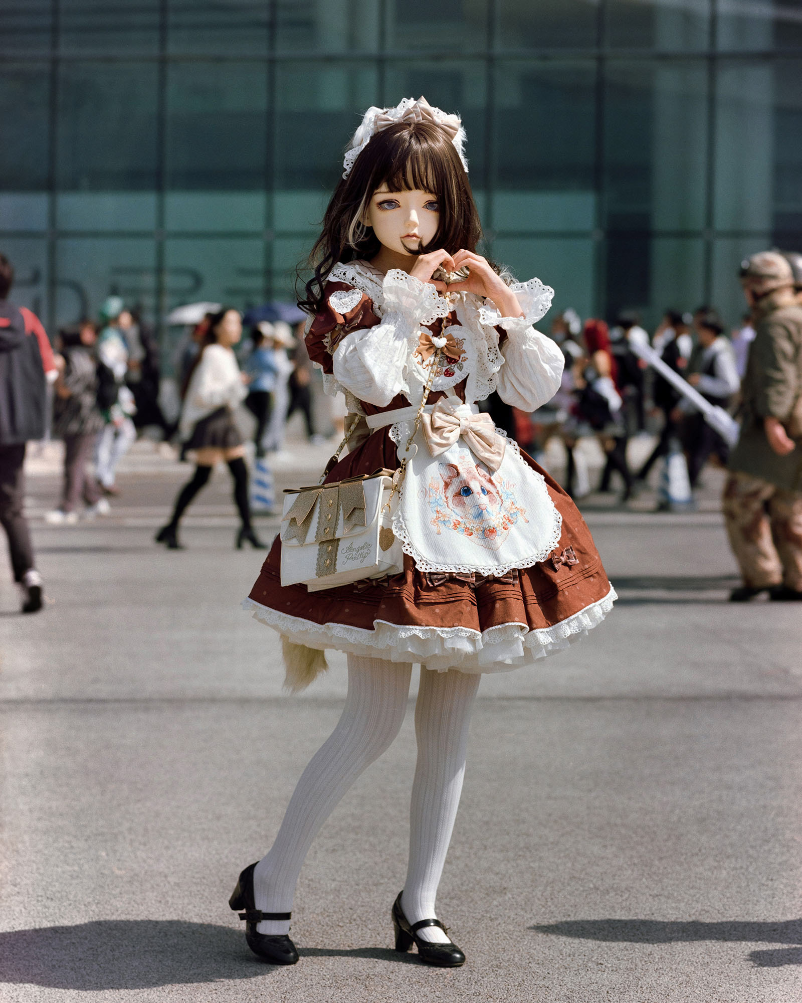Nai He. I met her through an online chat group. It was the first time I met her offline, at an anime convention. She was wearing a kigurumi mask. It's a spin-off culture of cosplay. She told me later that it saved her time putting on make-up.