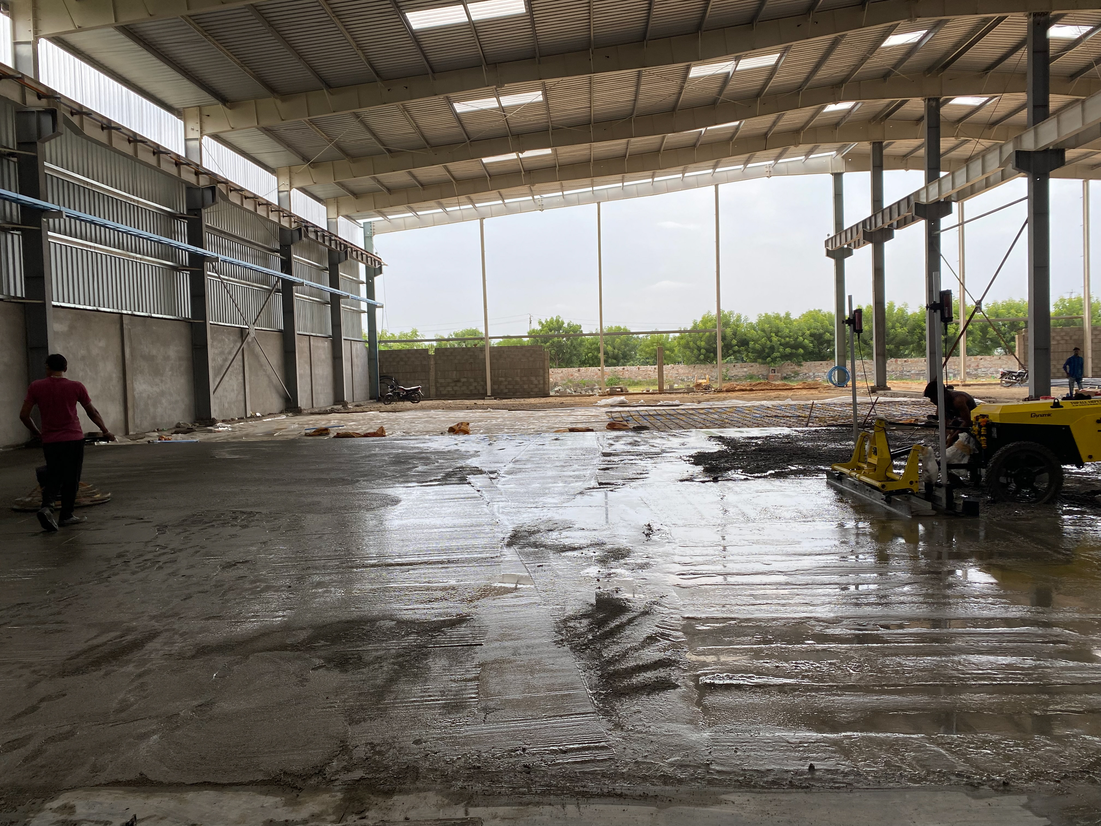 Laying of concrete using Laser screed machine