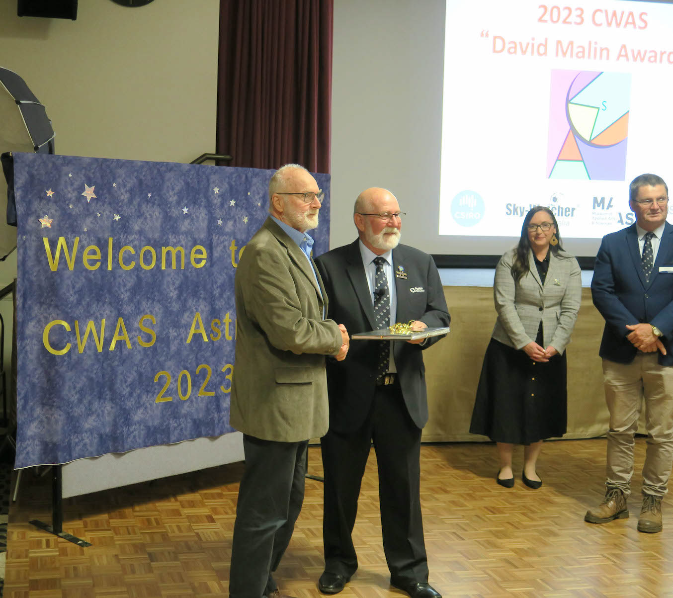 Cr Ken Keith presented Dr David Malin with a special Henry Parkes Medallion