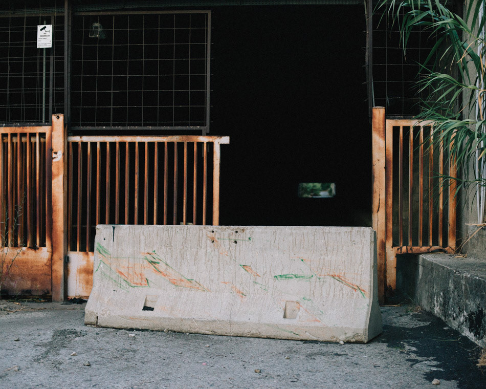 An underpass under the airport runway, closed to traffic to prevent it from becoming a landfill.
