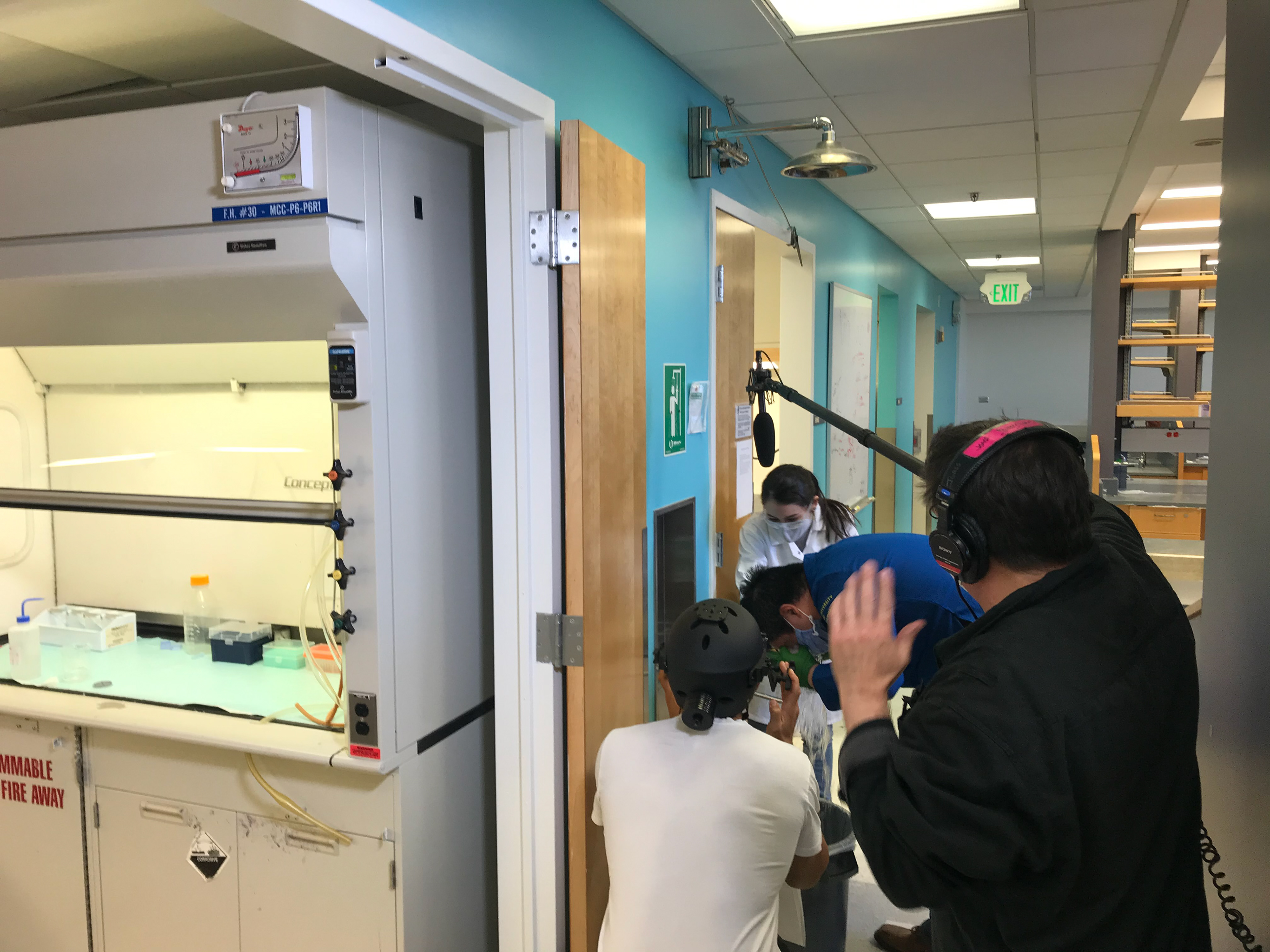 Camera crew and actors filming eyewash scene
