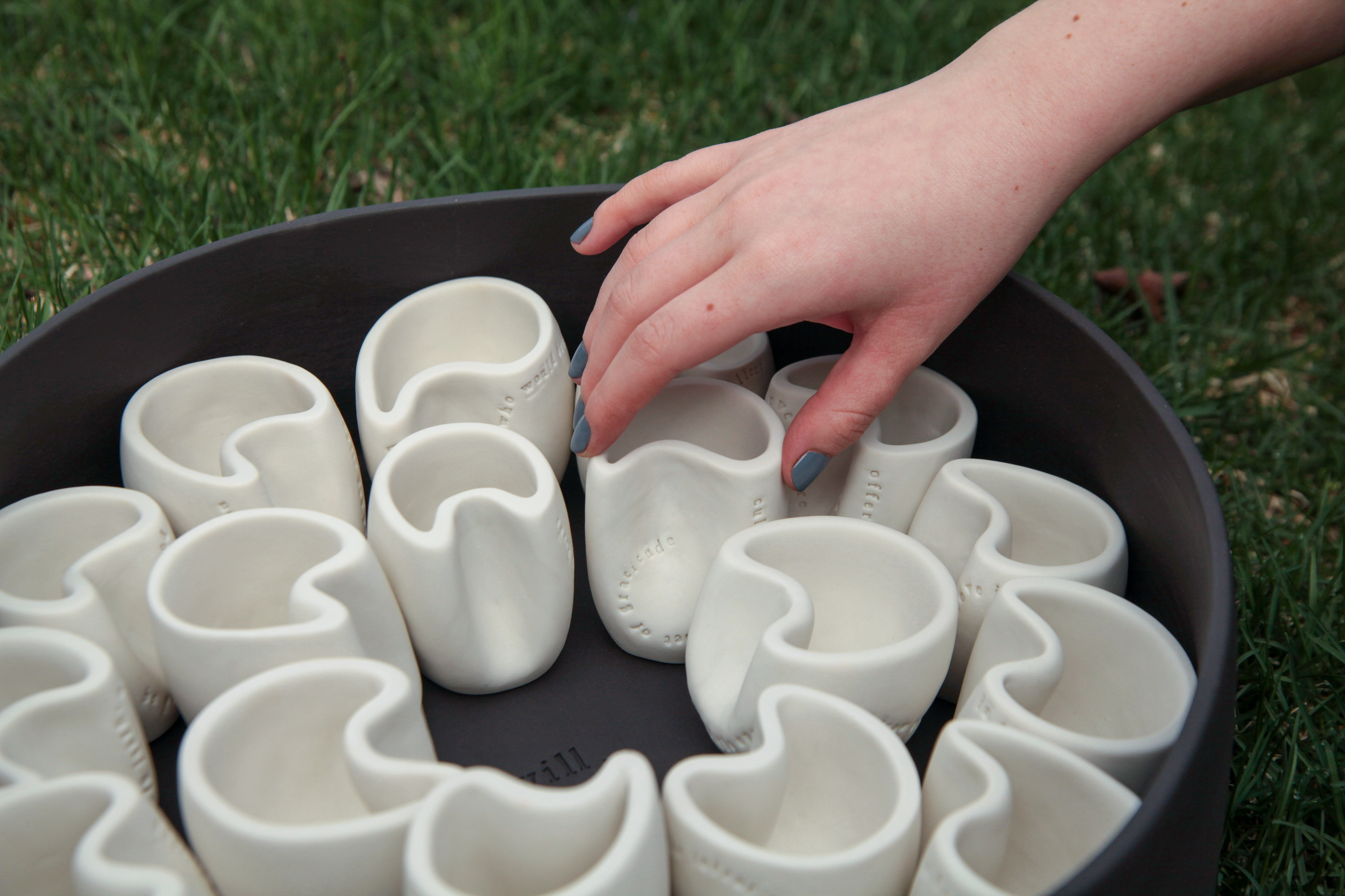 Community members are encouraged to claim their own cup | When a cup is claimed, the individual is committing to complete the act of kindness stamped on the cup