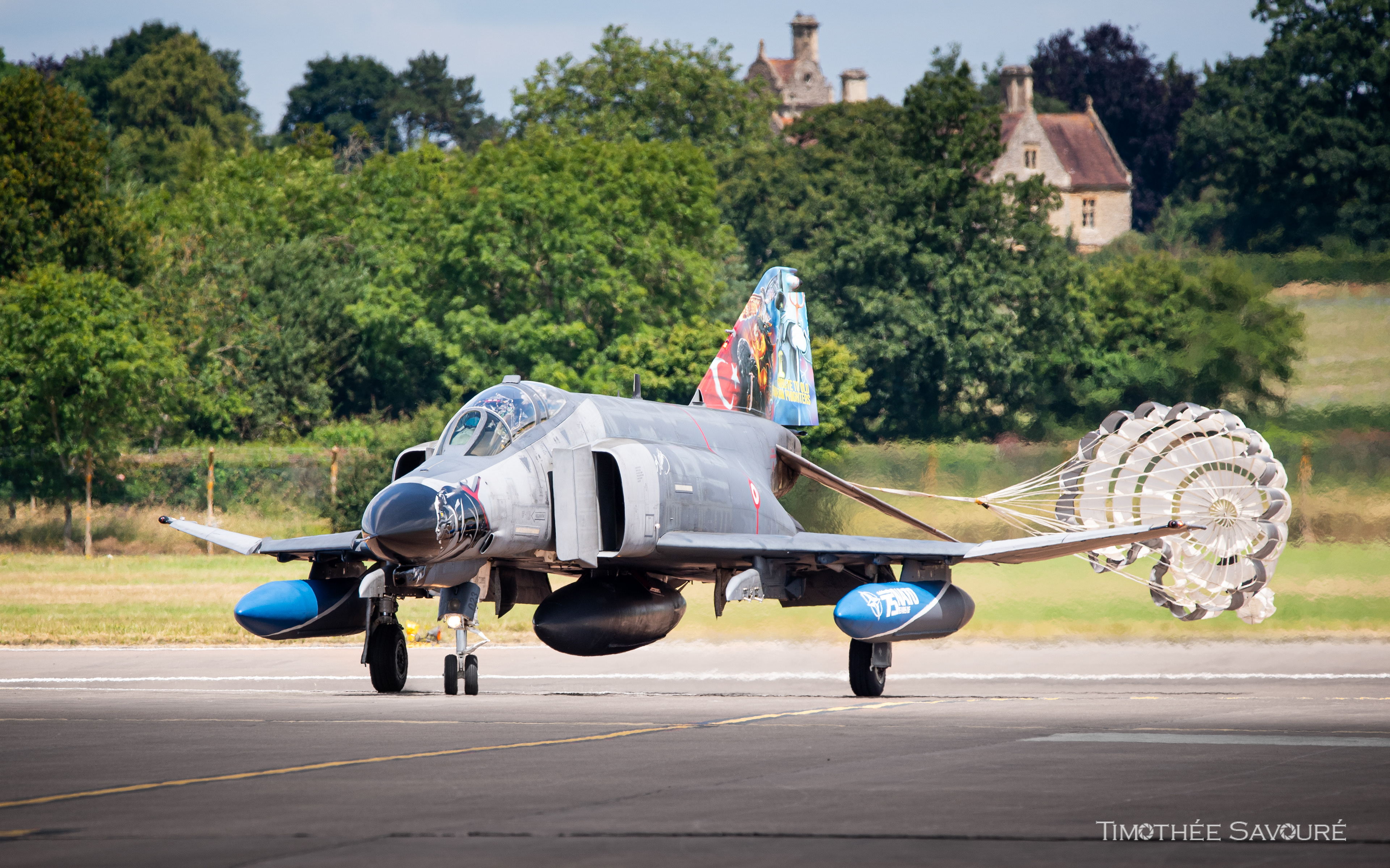 A specially decorated F-4E Phantom taxiing after landing in RAF Fairford, during RIAT 2024