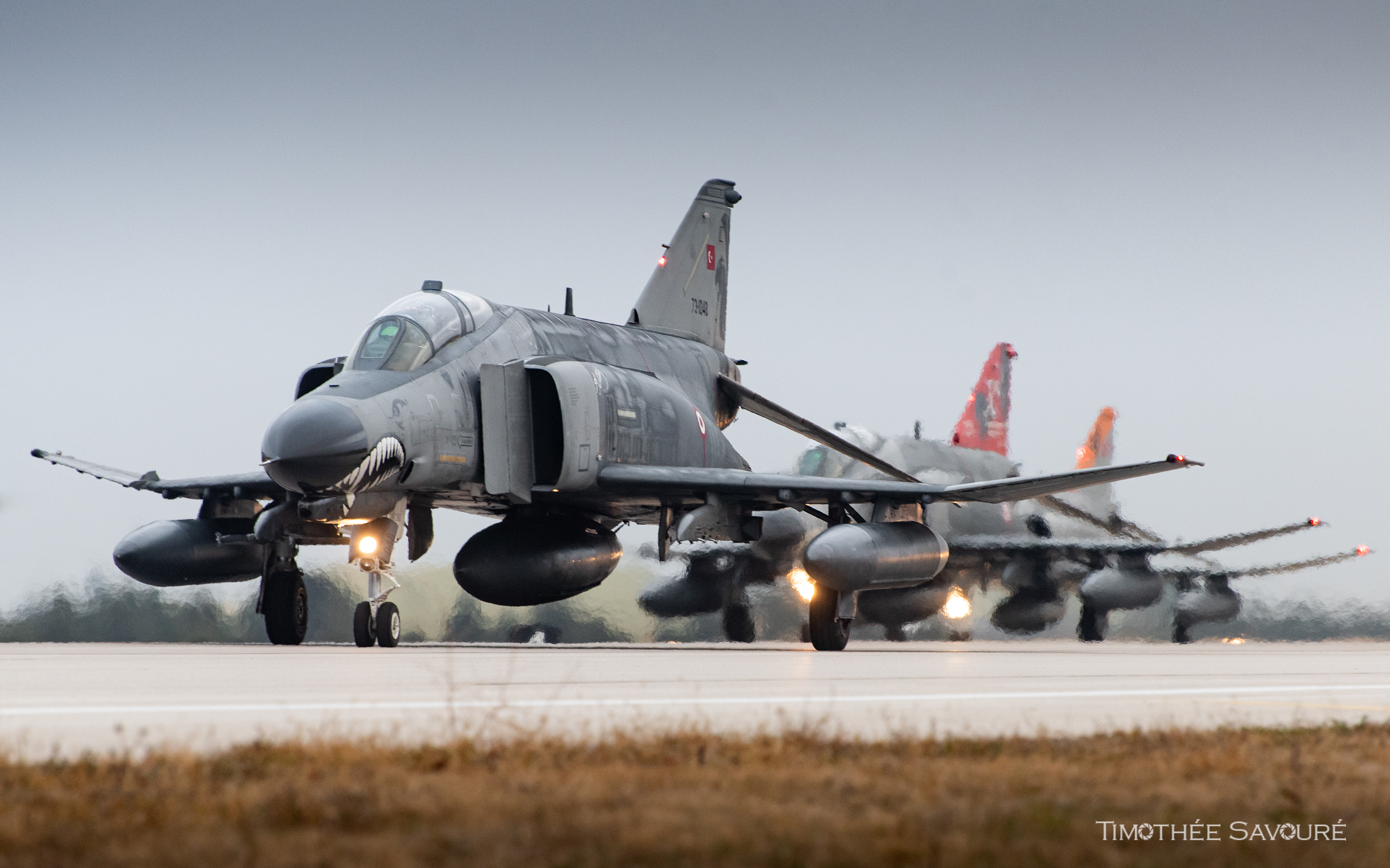 Three F-4s taxiing during the Turkish Air Force Elephant Walk