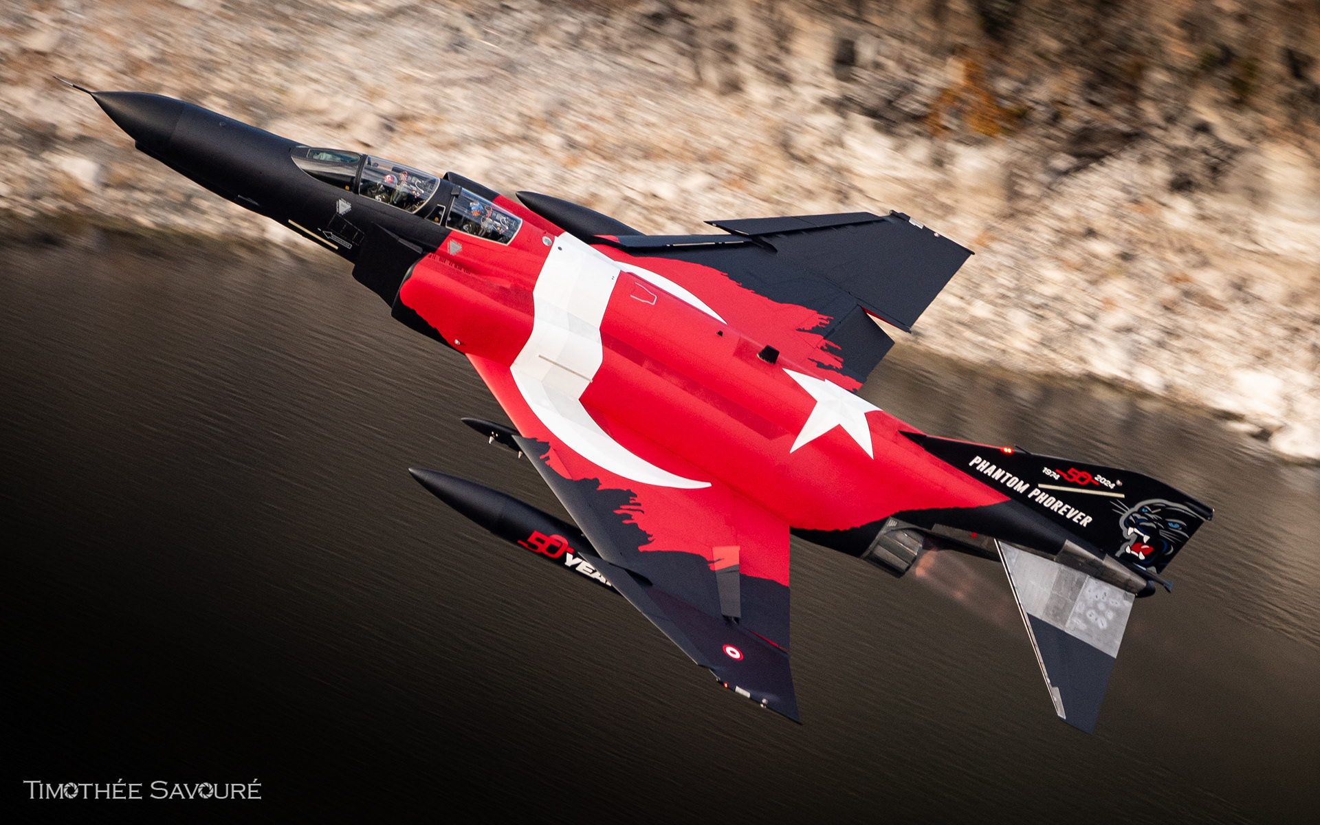 The specially painted F-4E Phantom for the 50th anniversary during the low level flight - 77-0303