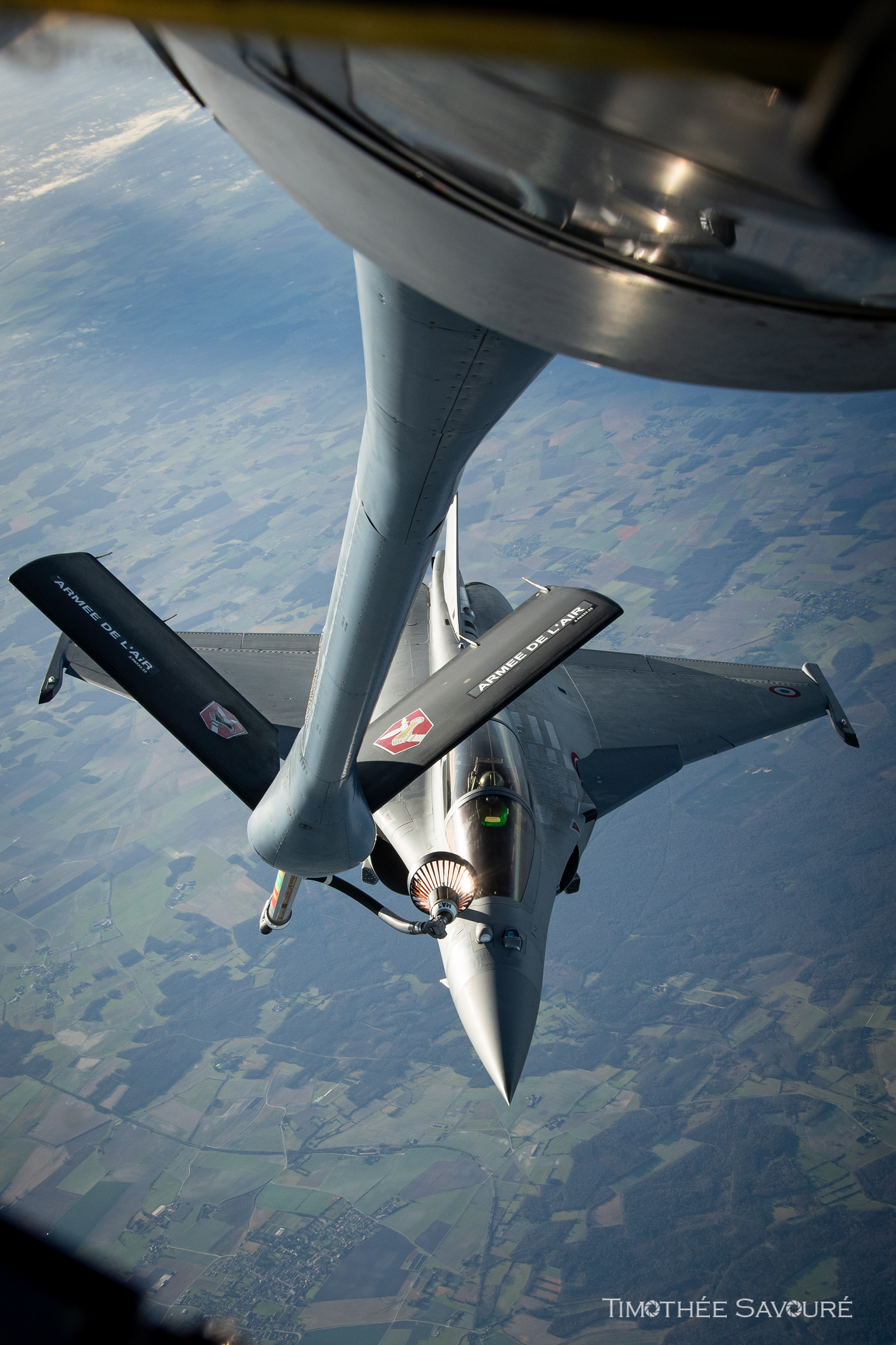 Air refueling onboard a French KC-135RG with a Rafale B