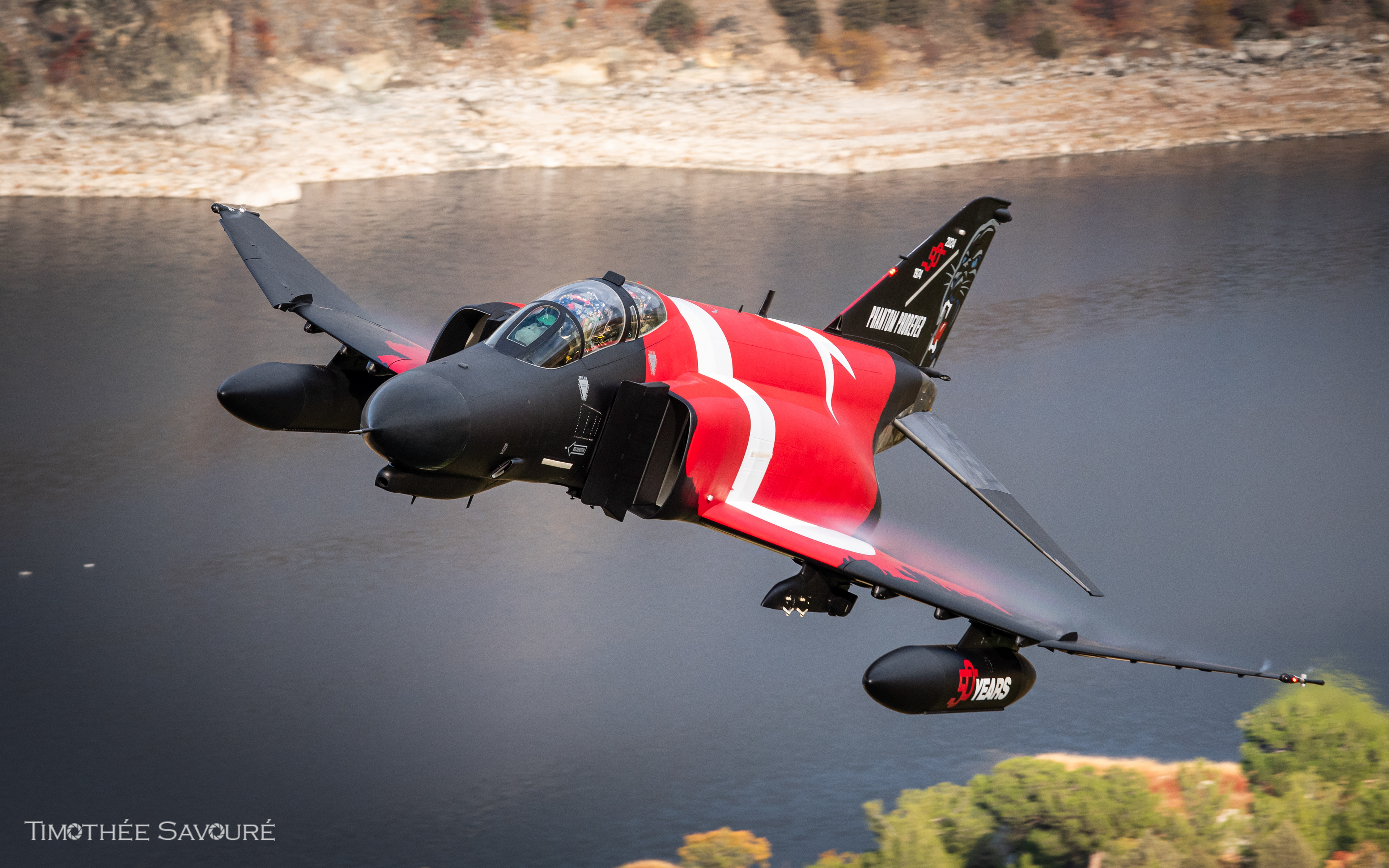 The specially painted F-4E Phantom for the 50th anniversary during the low level flight - 77-0303