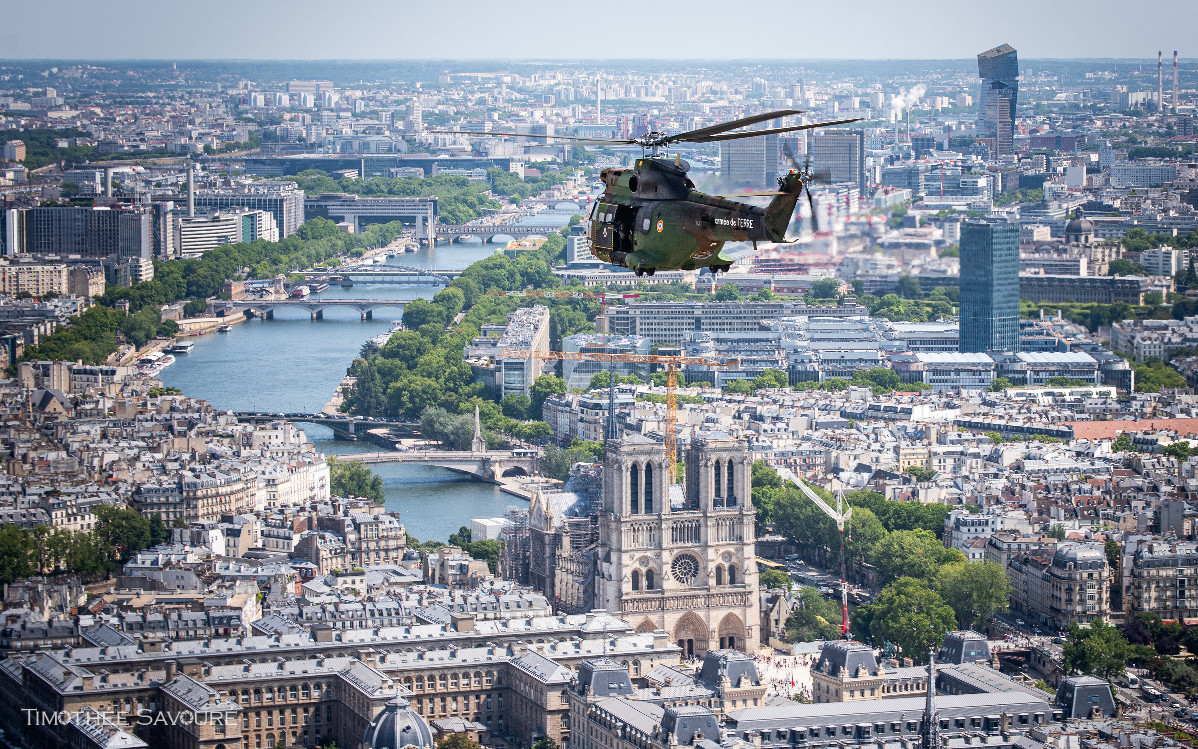 SA330 Puma from ALAT over Notre-Dame during Bastille Day rehearsals