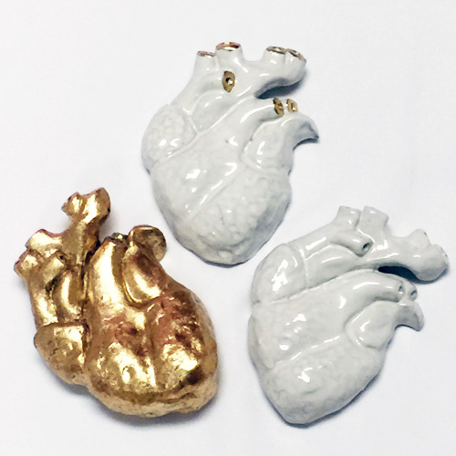 Hearts, 2016, white glaze and gold leaf