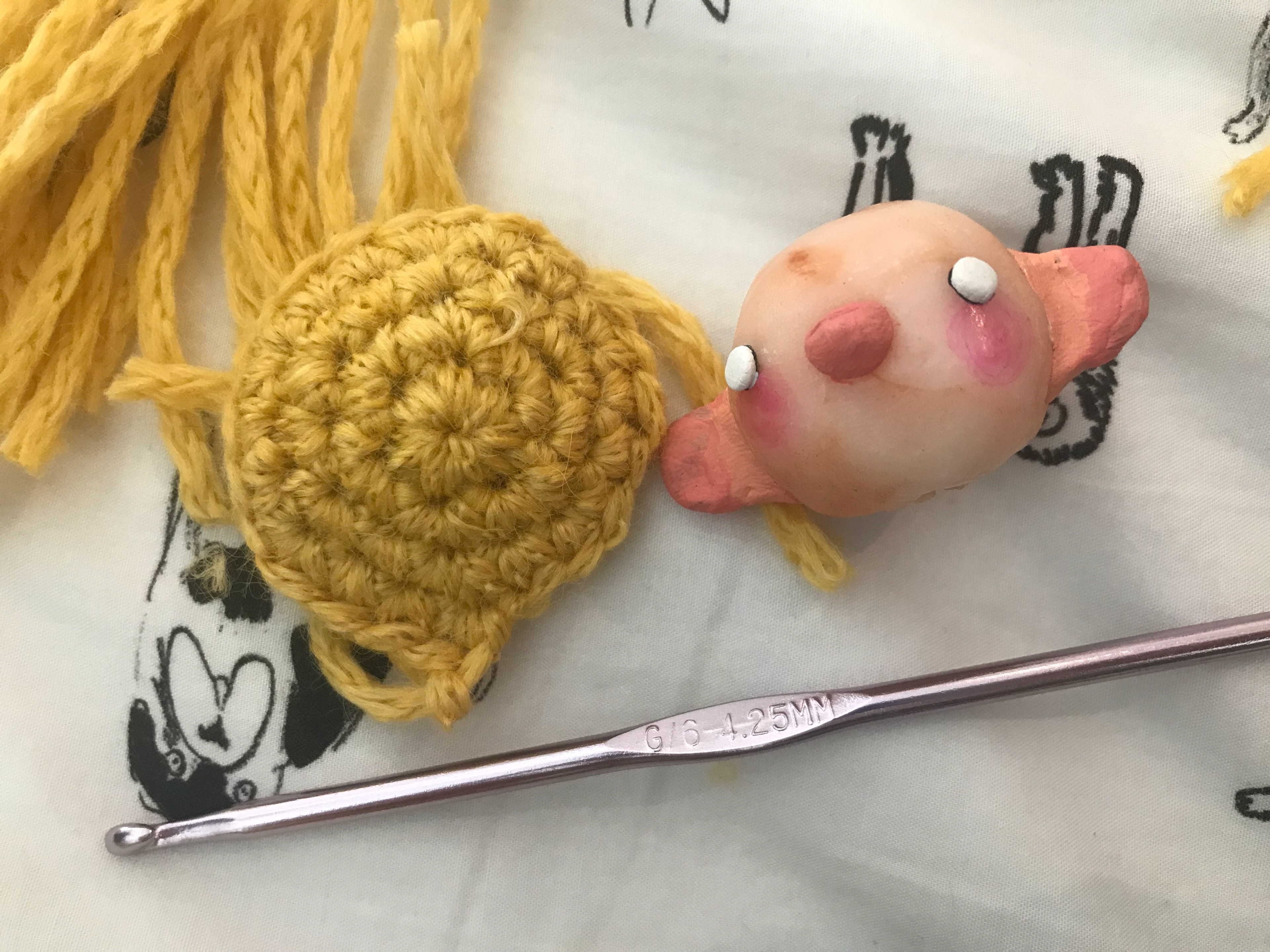 Puppet head and wig cap, "Breaking!"