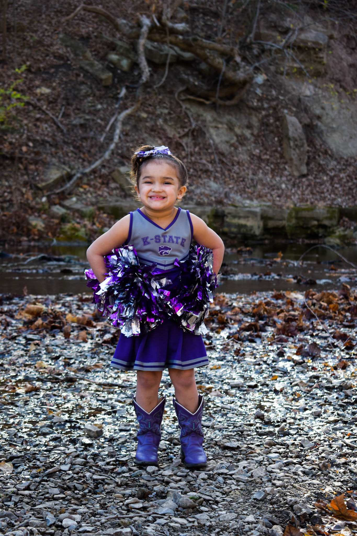 Portrtait of little girl with K-State cheer uniform