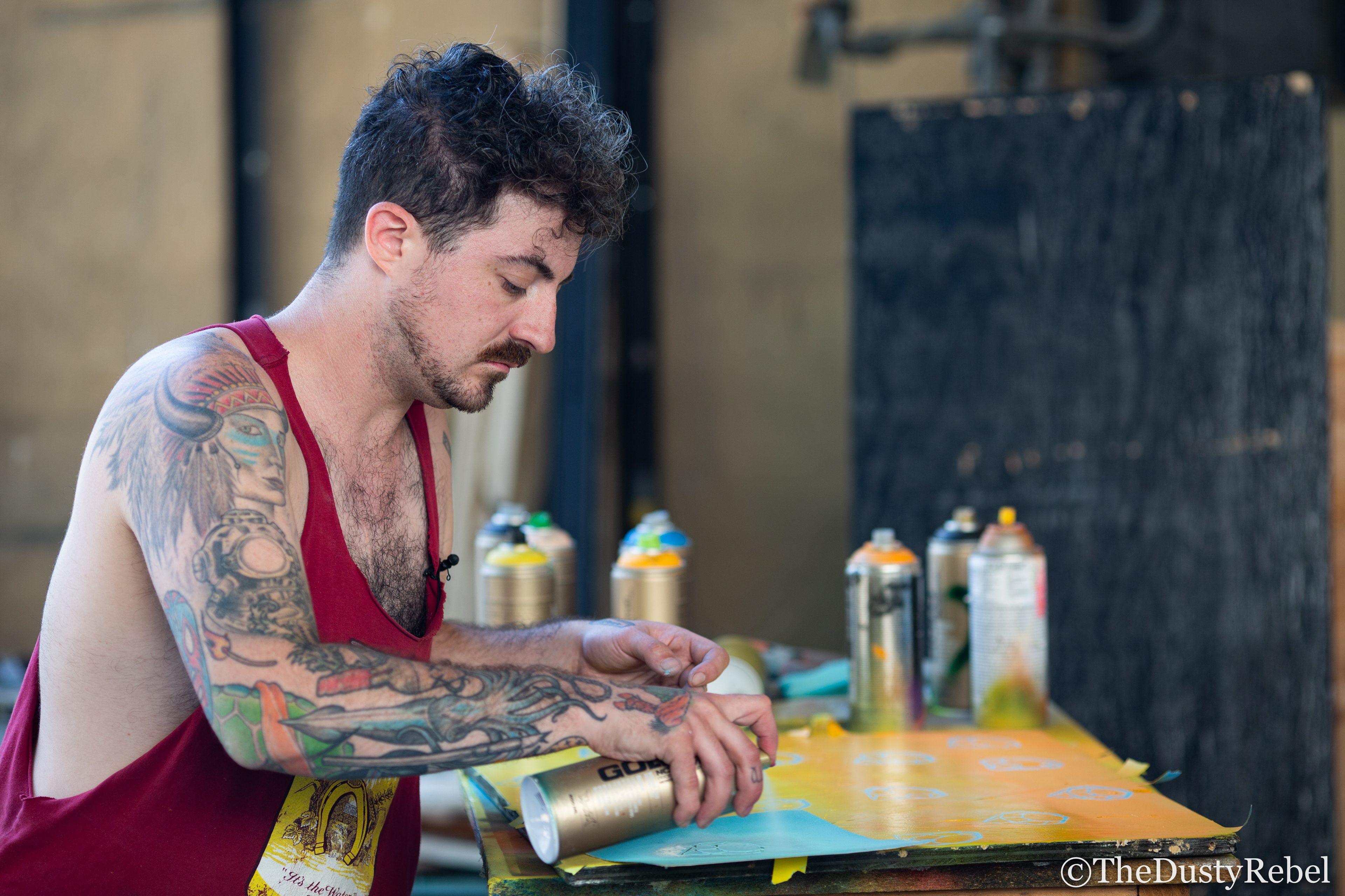 Ace Troy painting in his studio in Portland, OR (2019)
