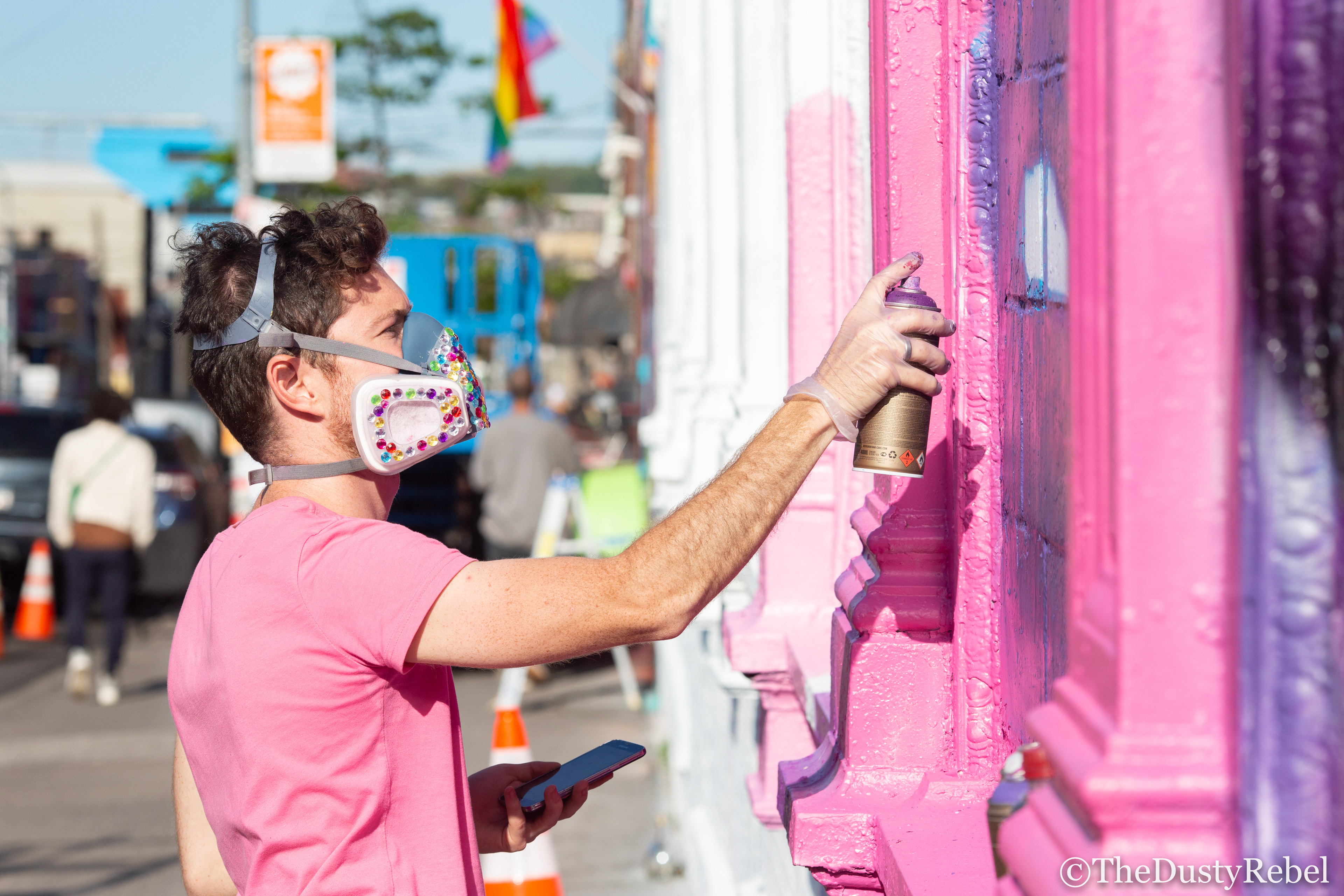 David Puck painting a mural in Brooklyn (2019)