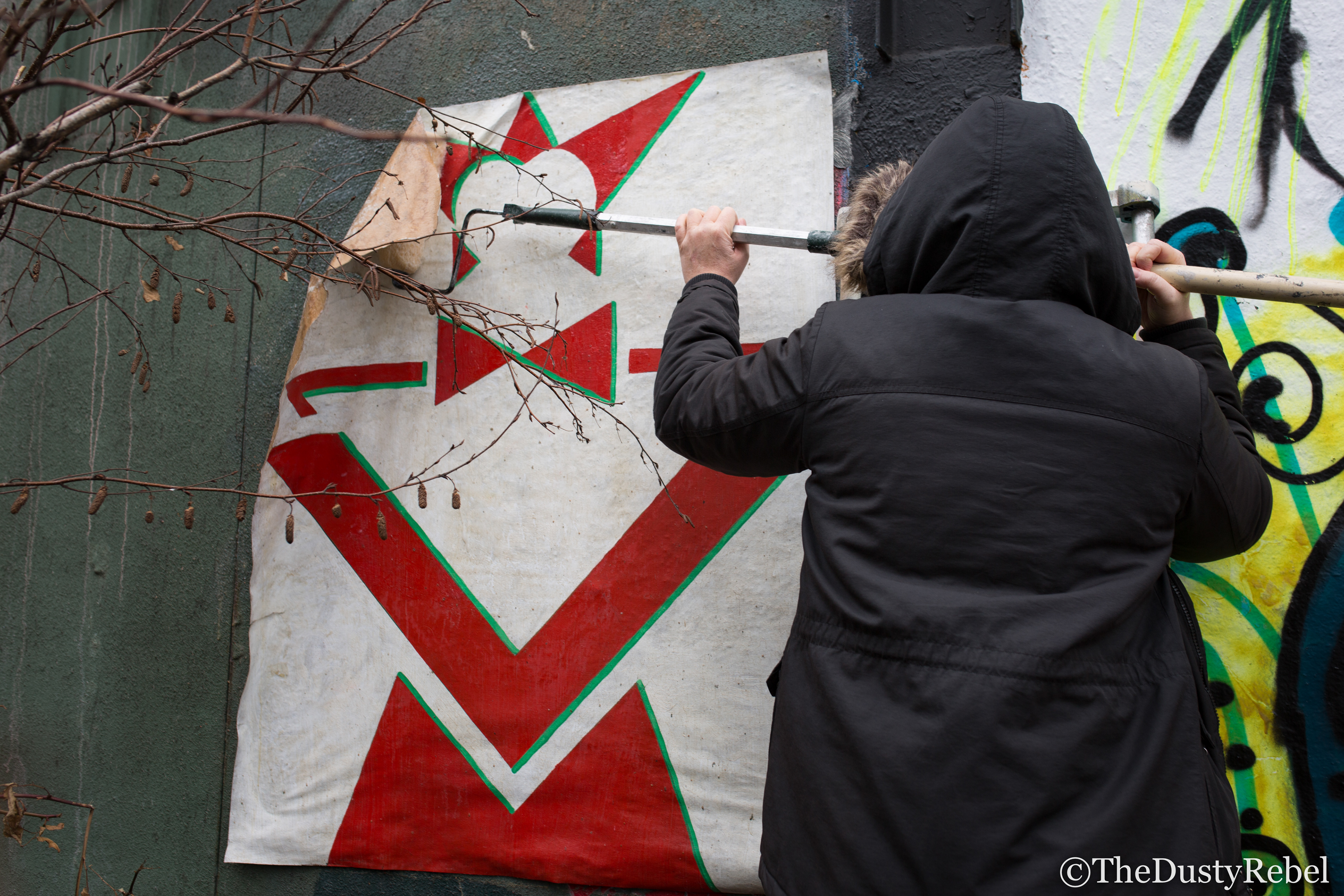 Bludog10003 pasting a portrait of Klaus Nomi in NYC (2018)