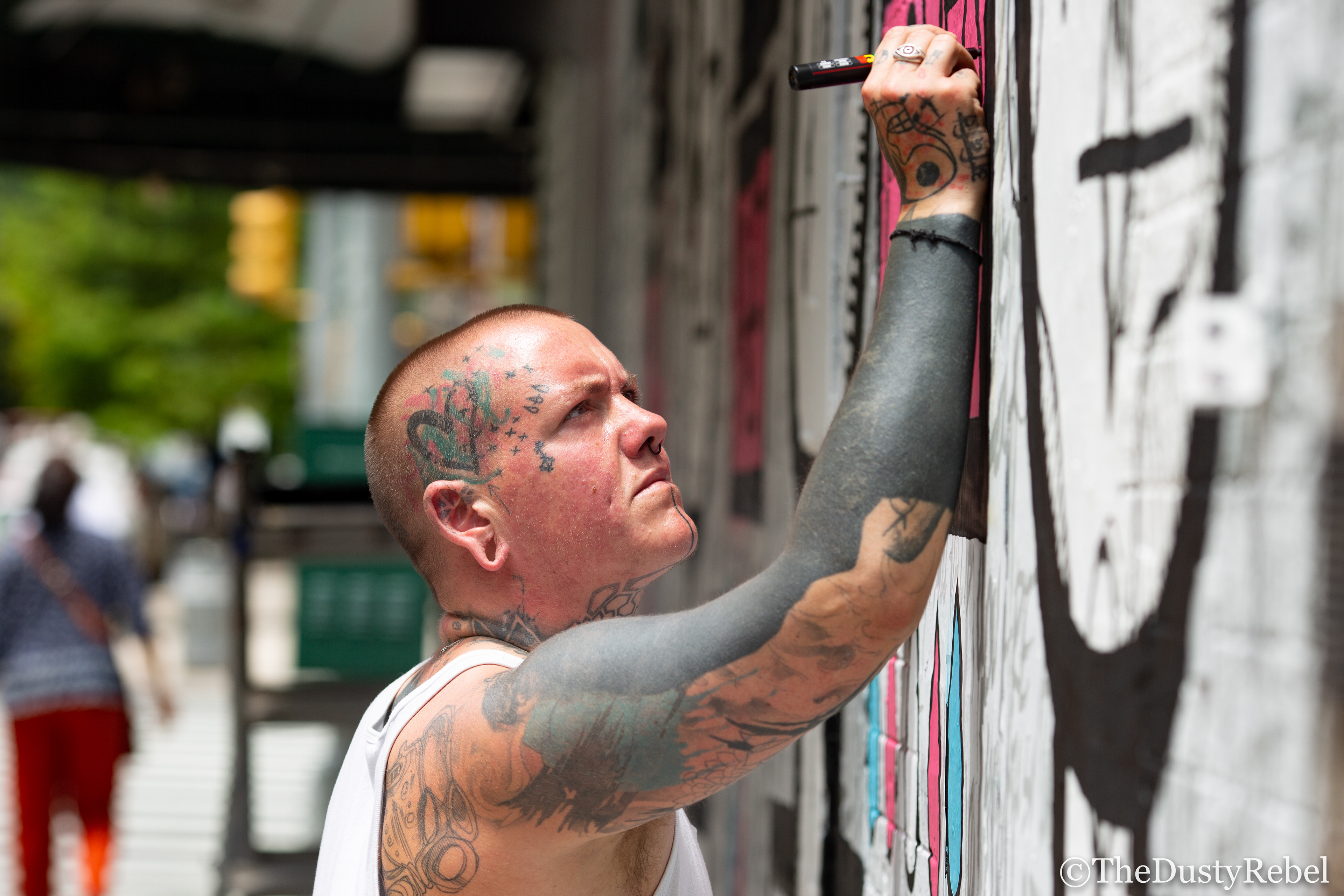 Mr Samo working on a mural in New York City (2019)