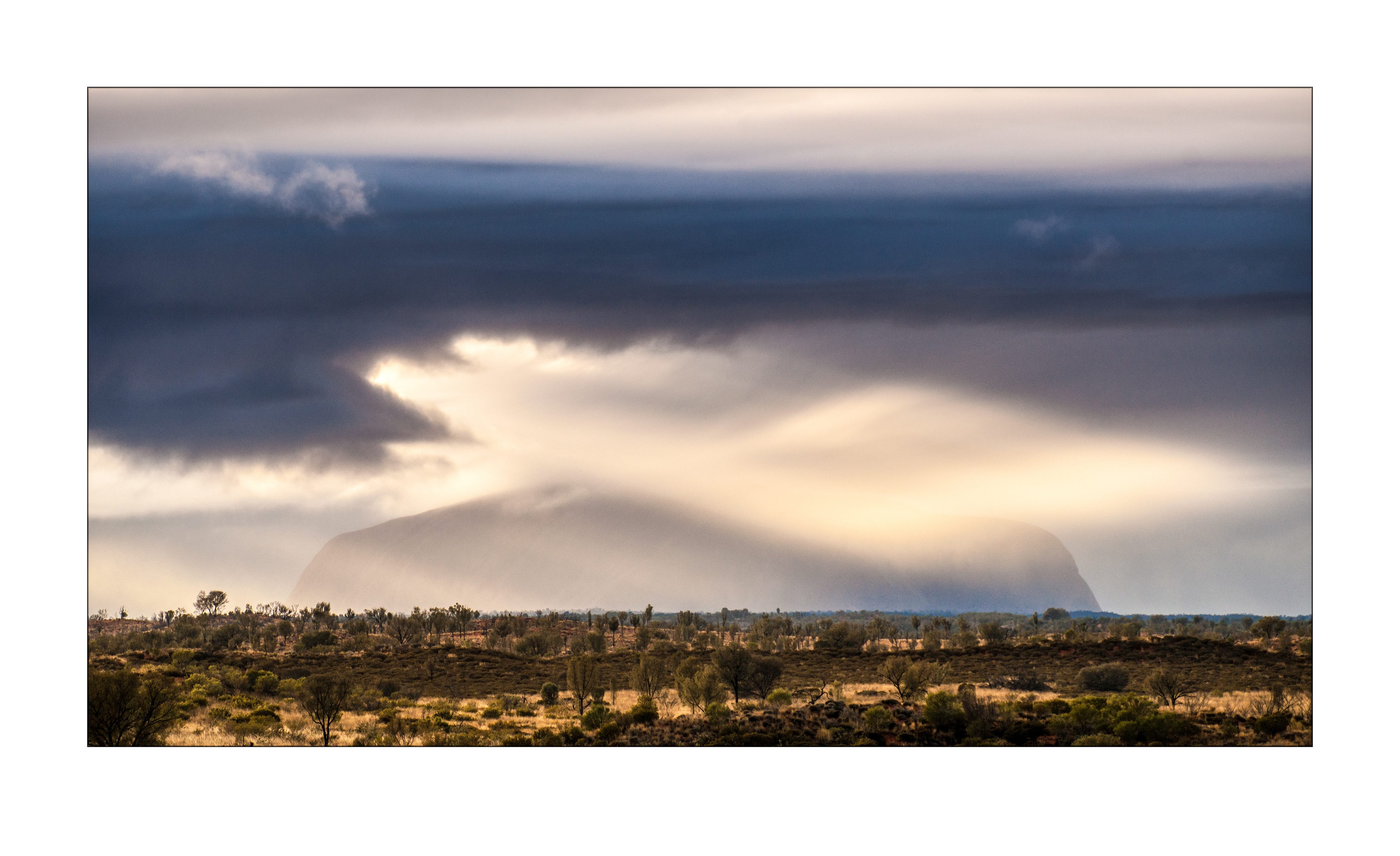 Katabatic Cloud Spotlights on Uluru.