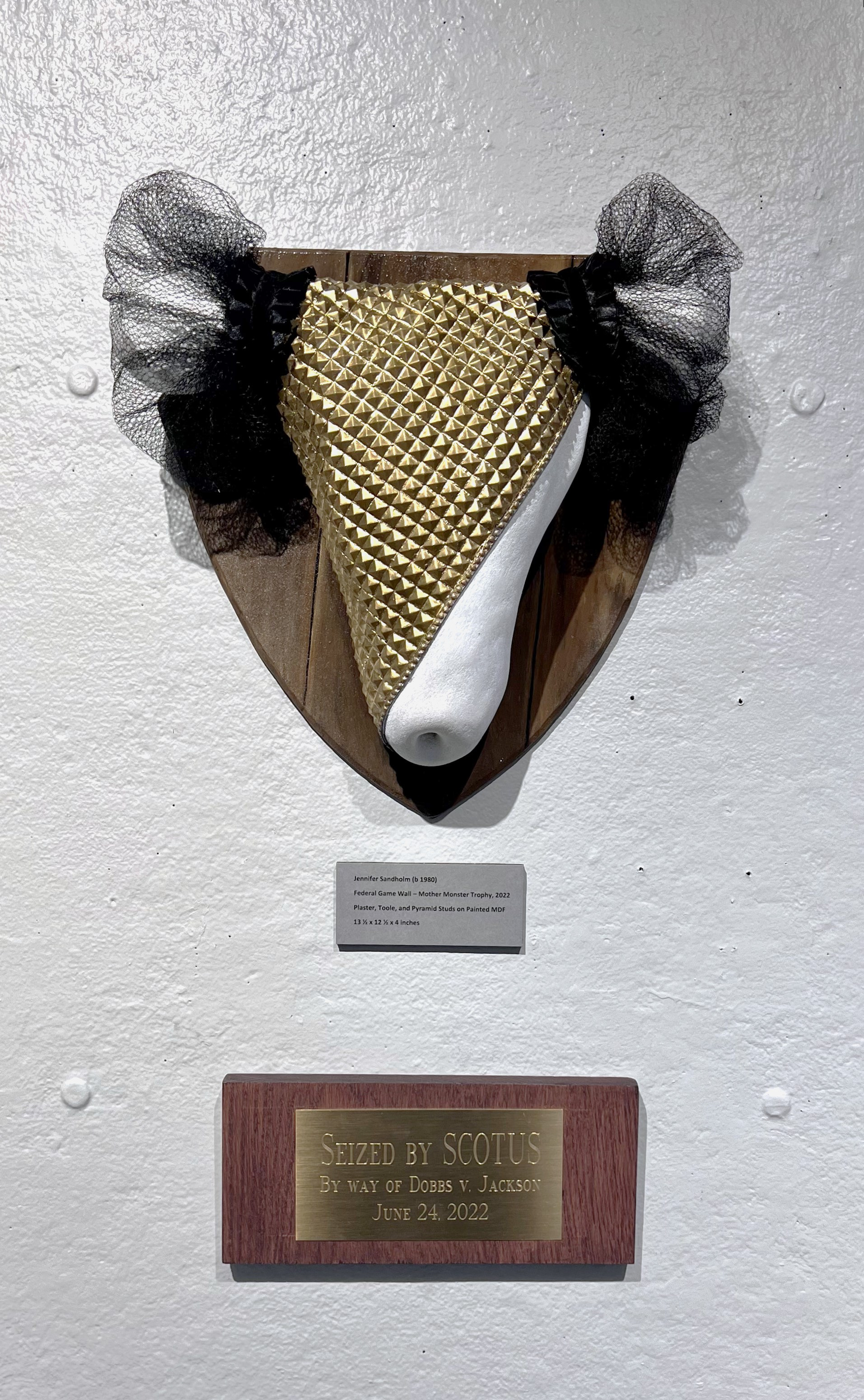 Federal Game Wall – Mother Monster Trophy, 2022 Plaster, Toole, and Pyramid Studs on Painted MDF  13 ½ x 12 ½ x 4 inches