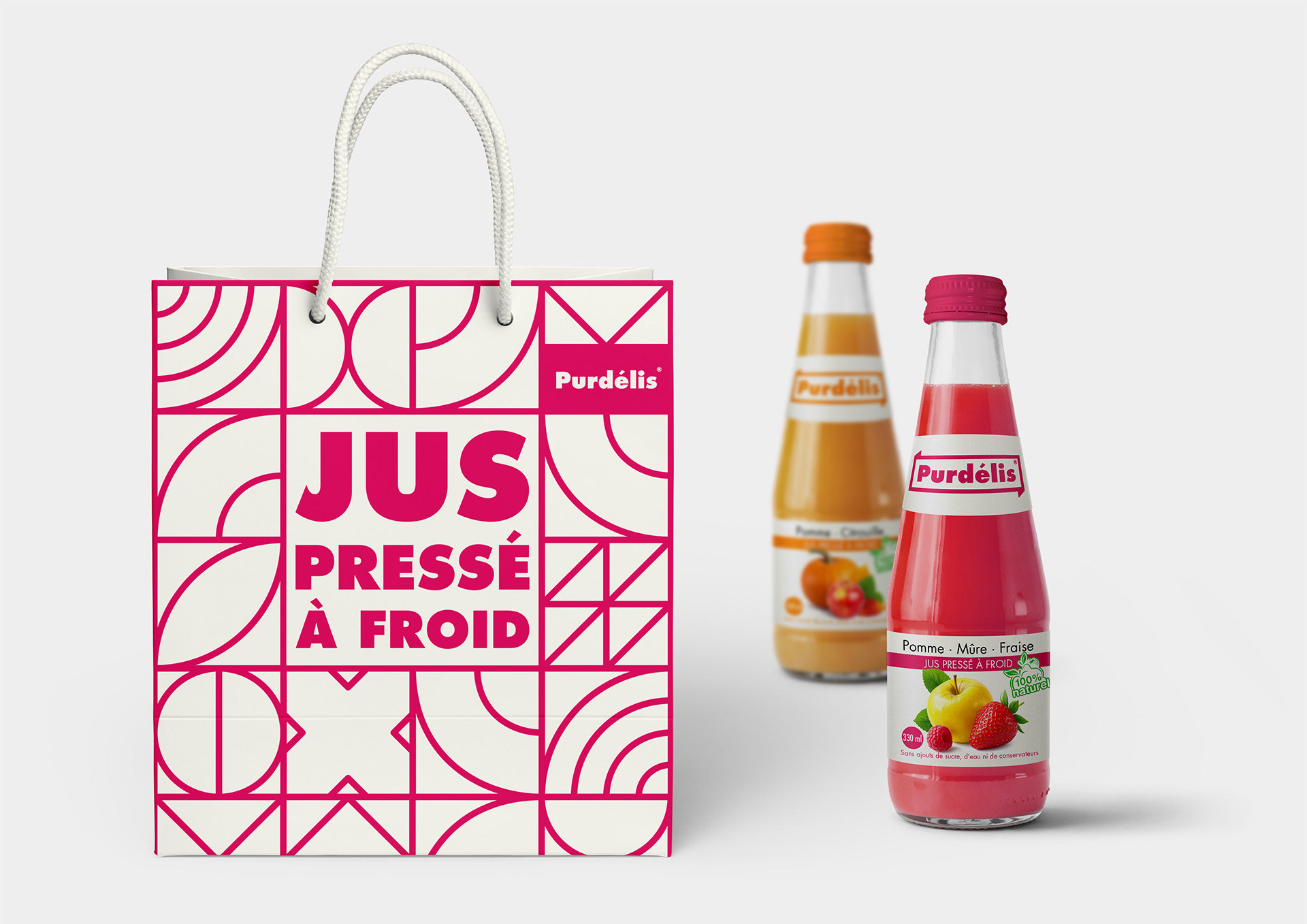 Purdélis natural juice packaging and label design with color-coded glass bottles by Dima Rykov