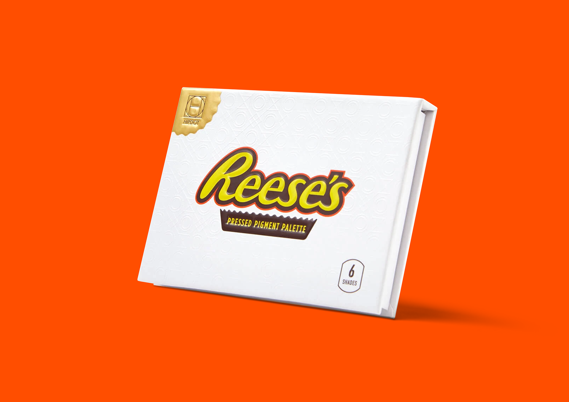 HIPDOT x REESE'S cosmetics packaging design featuring eyeshadow palettes, lip balms and makeup brushes by Dima Rykov