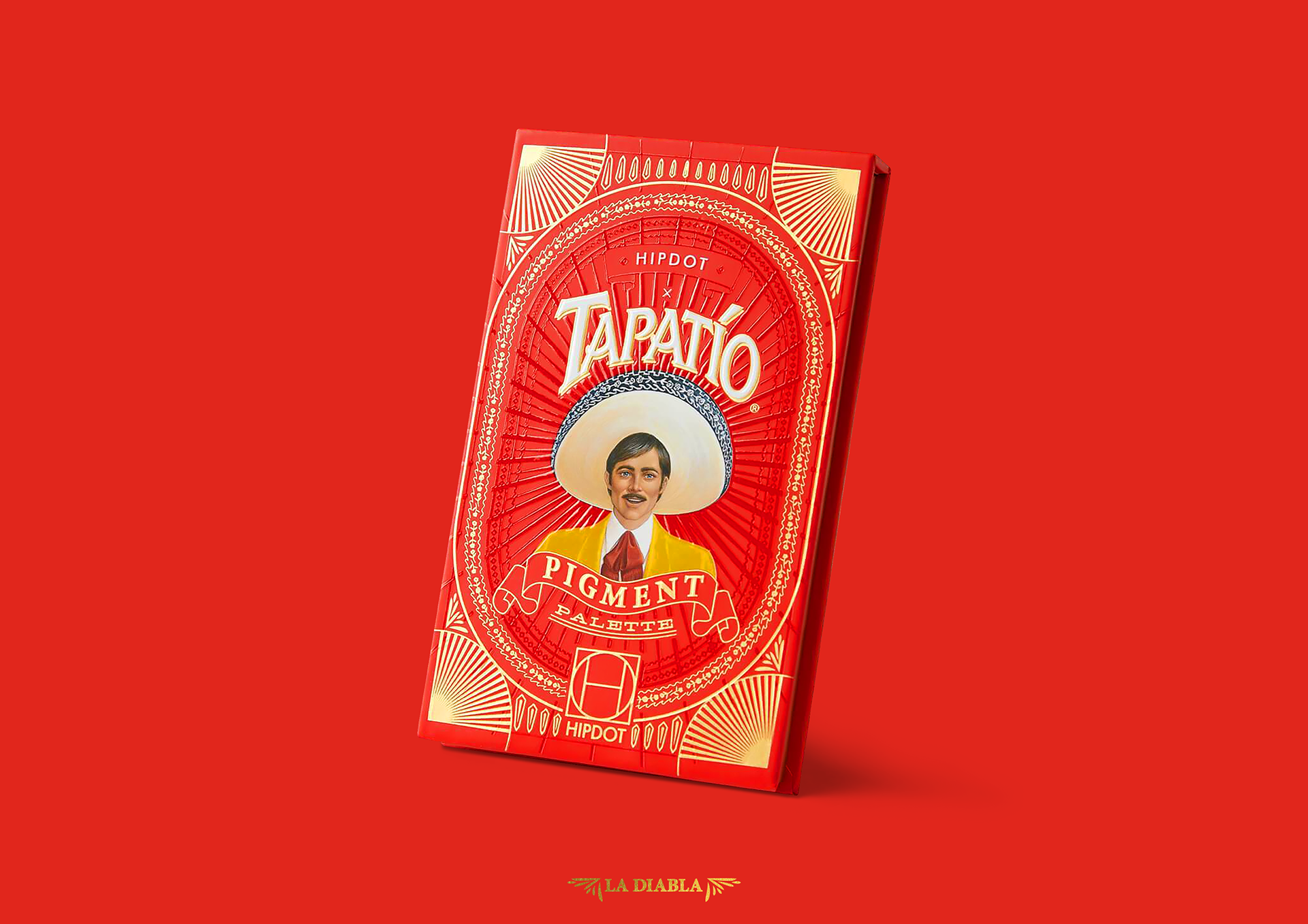 HIPDOT x TAPATÍO makeup packaging with LA DIABLA and EL DORADO pigment palettes, hot sauce bottles and red peppers by Dima Rykov