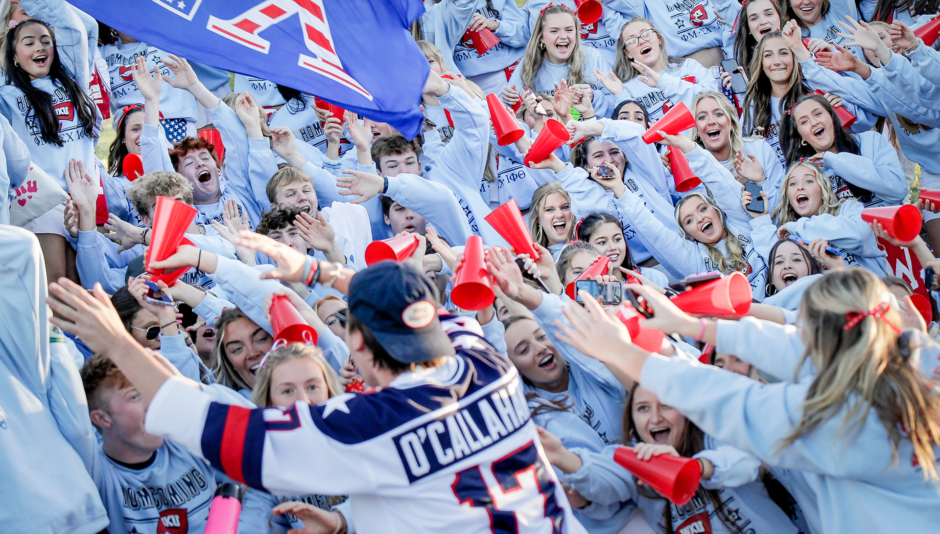 Greek life members of the Fraternities Sigma Chi, Iota Phi Theta and Sorority Phi Mu all participate in chants before the parade begins at Western Kentucky University’s annual Homecoming Parade in Bowling Green, Ky., on Nov. 10, 2023.