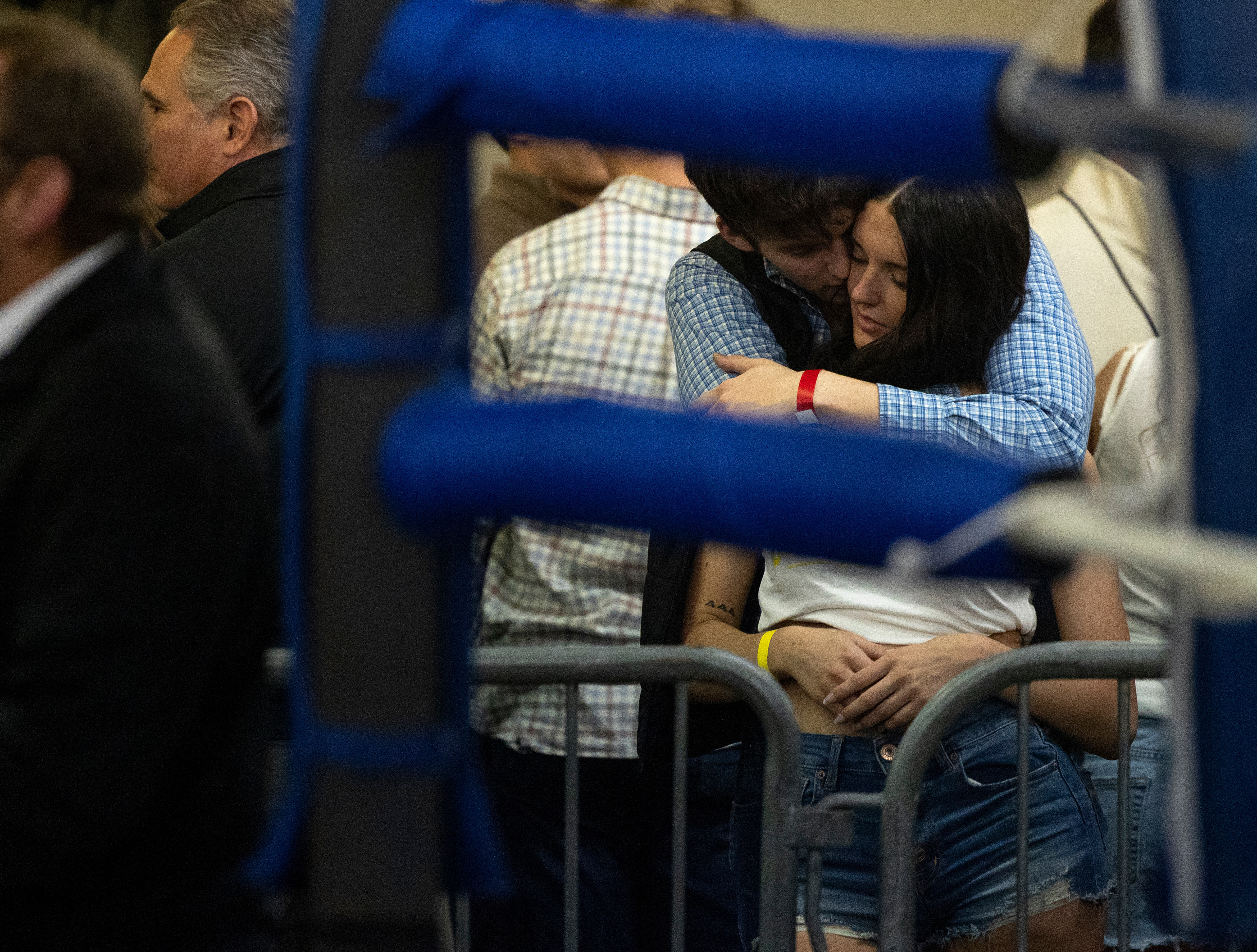 Management senior Caleb Puckett holds Sydeny Purcell, a Biology-Chemistry sophomore, in between bouts at the Sigma Chi Fight Night event in Bowling Green, Ky., on Feb. 28, 2025. “We’re not together right now, but kind of.” Puckett said.