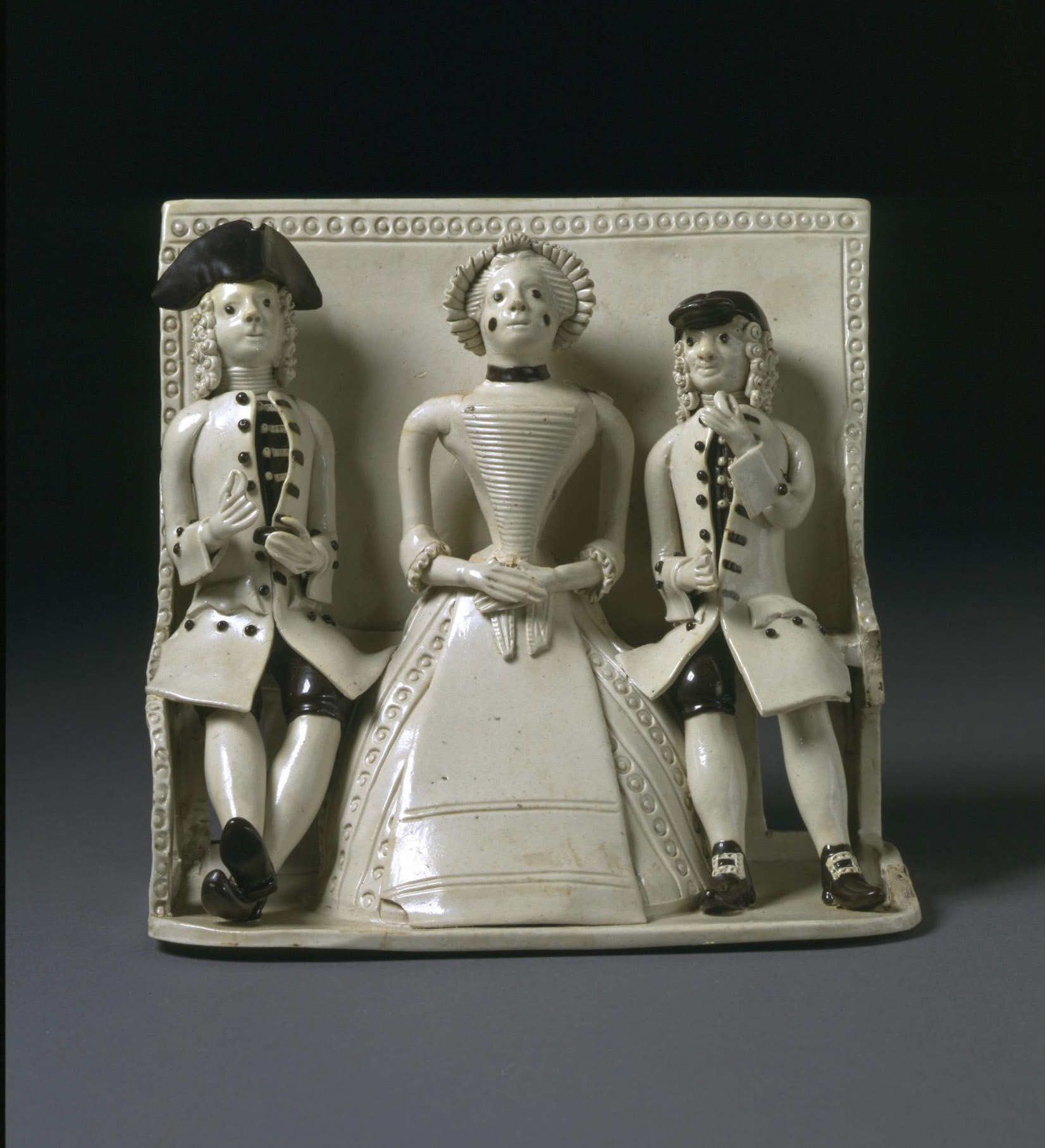Staffordshire pew group (c.1750) Salt-glazed stoneware. V&A