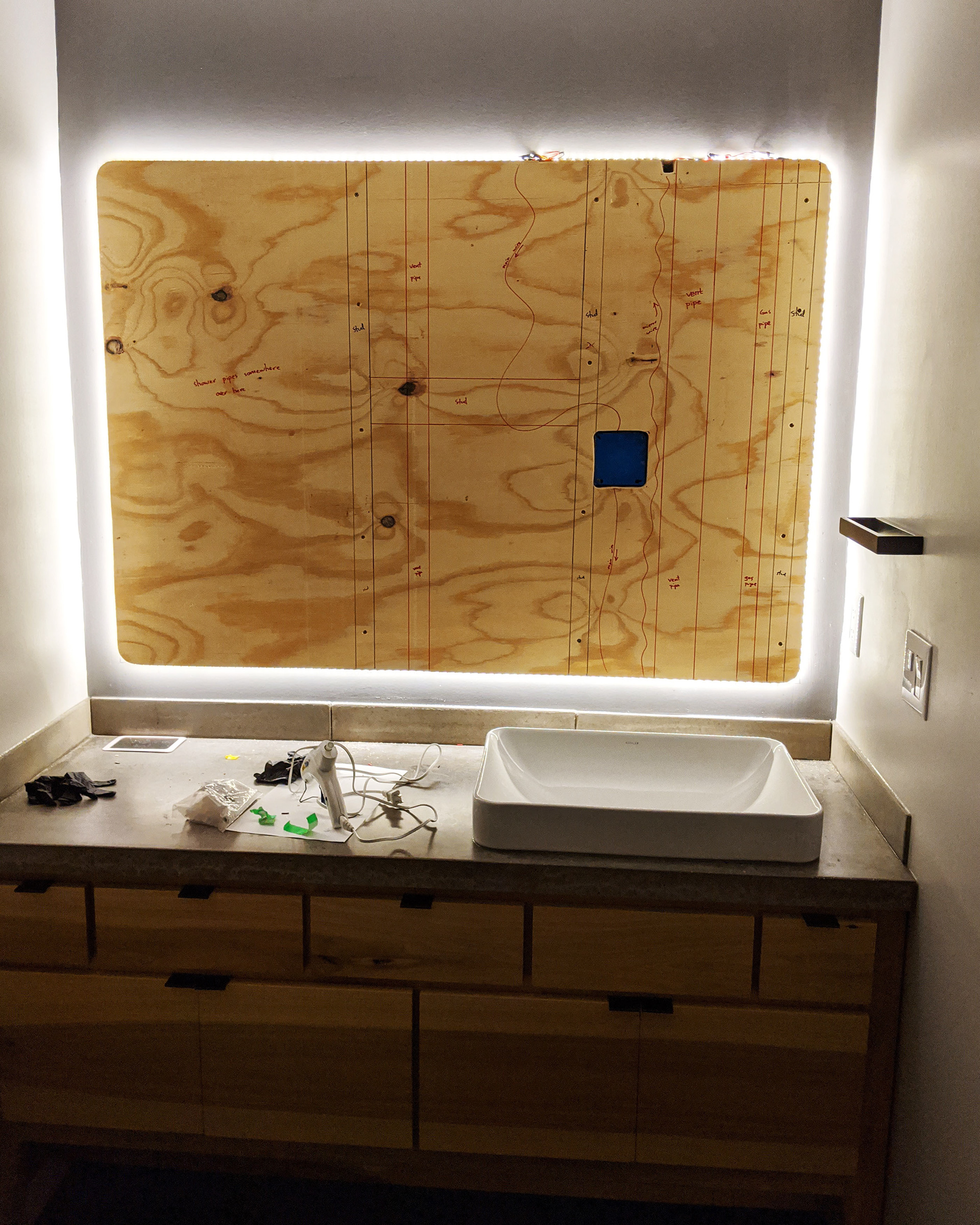 Plywood mount for mirror and LED backlight.