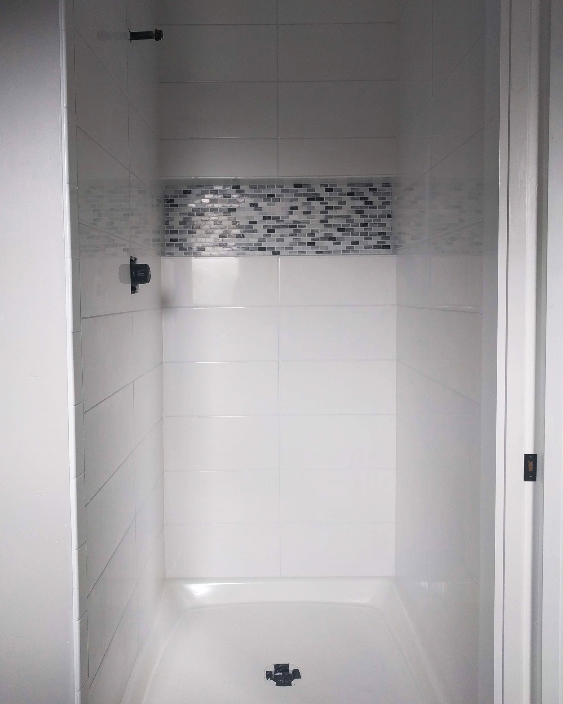Hired someone else to do the shower tile.