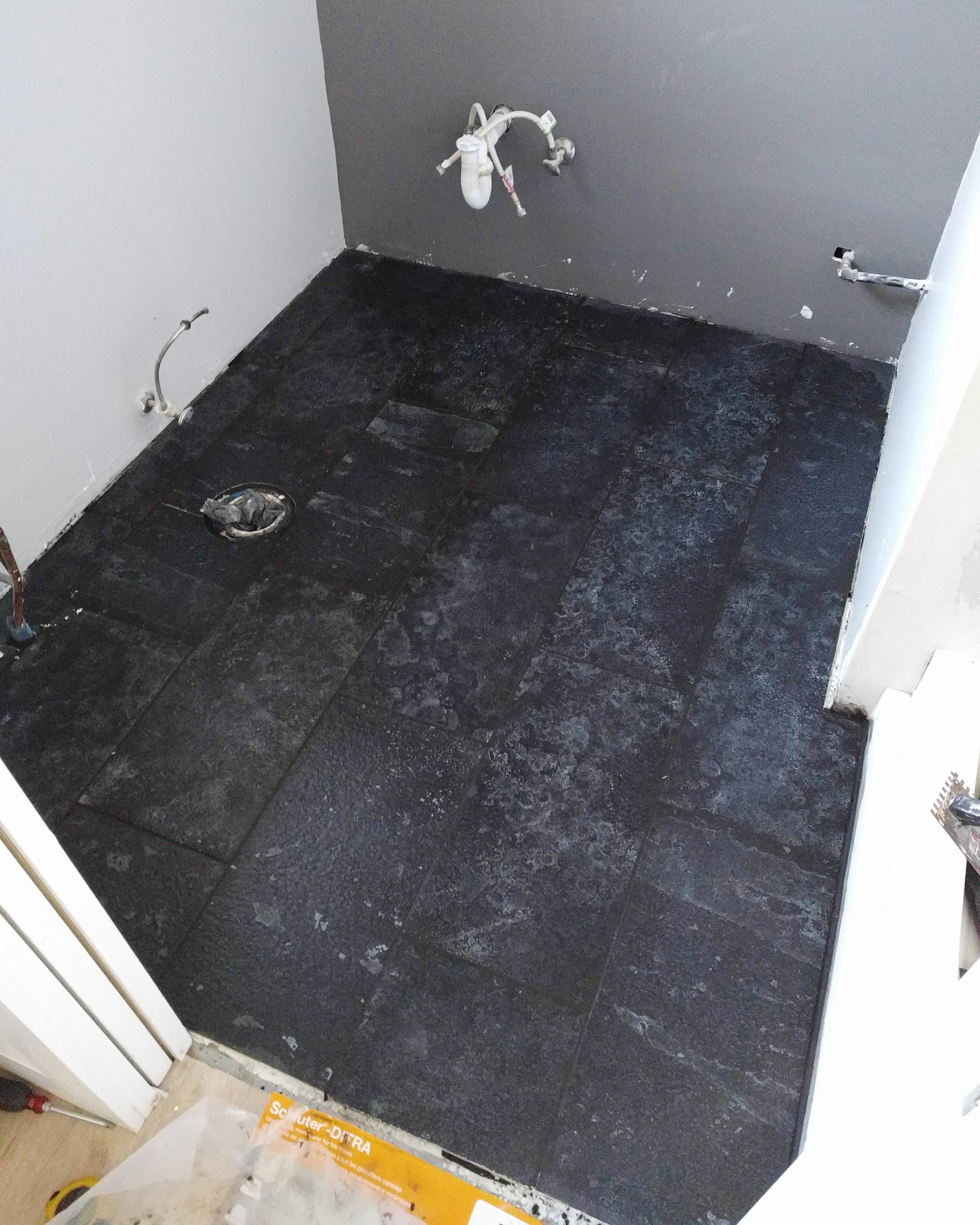 Laid and grouted tile.