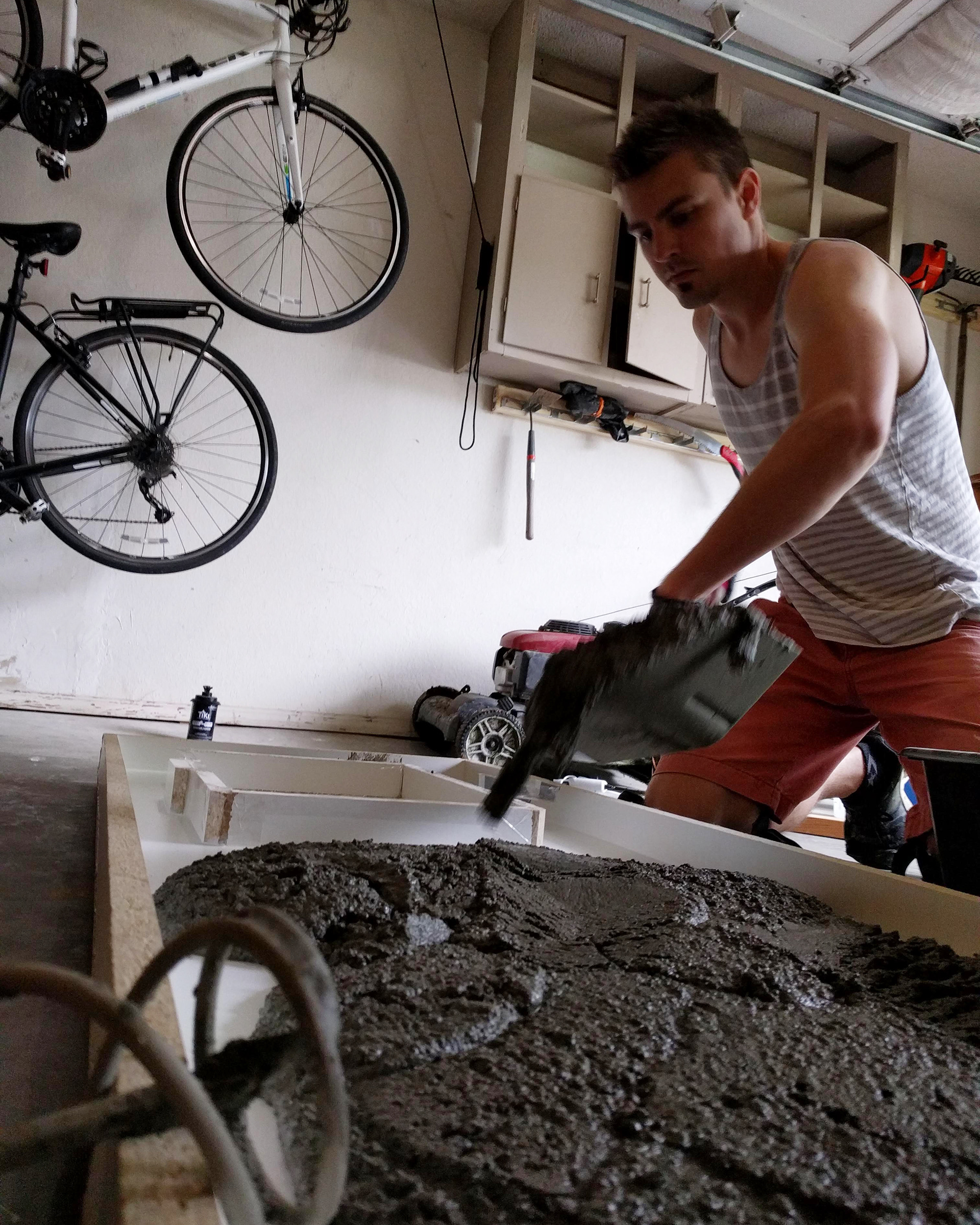 Pouring concrete for the countertop.