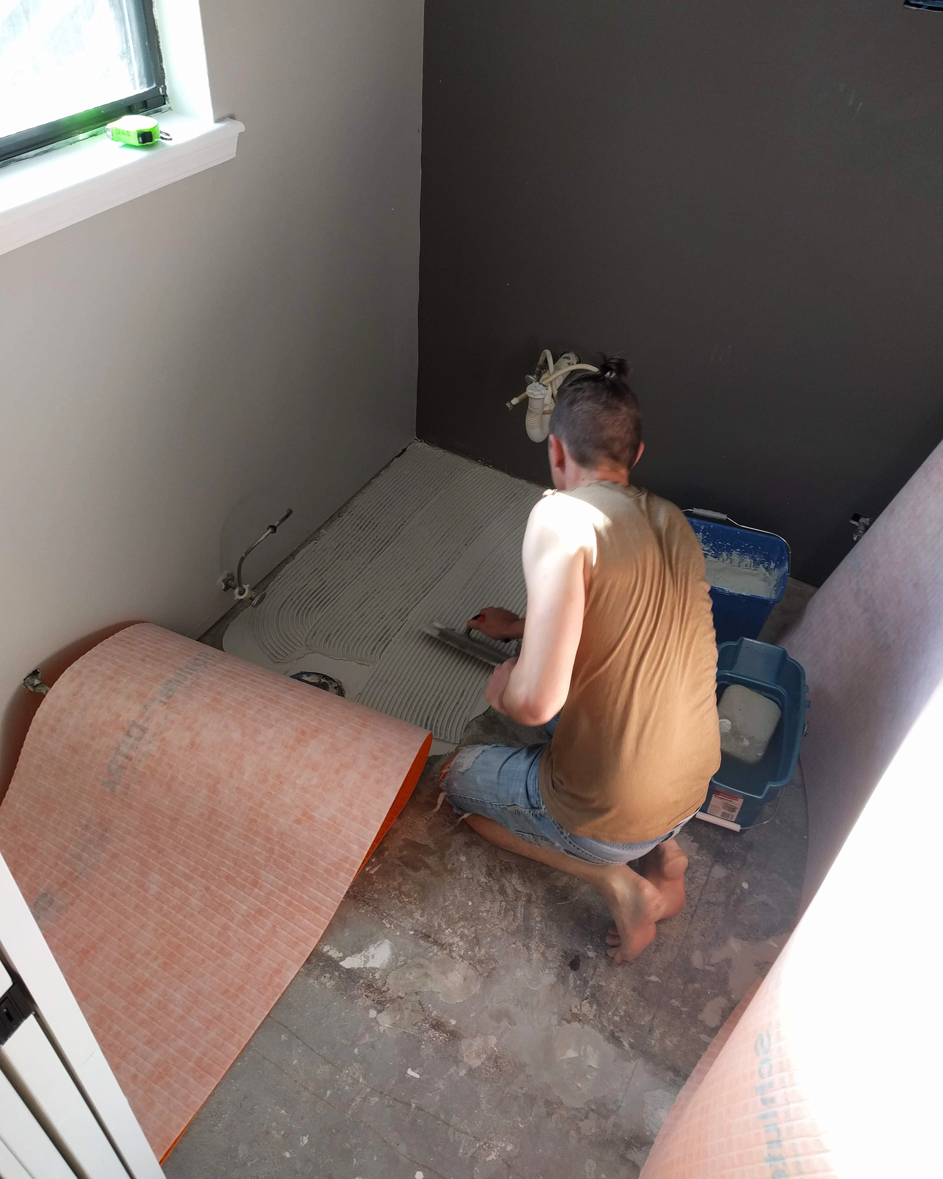 Installing the base for the tile.