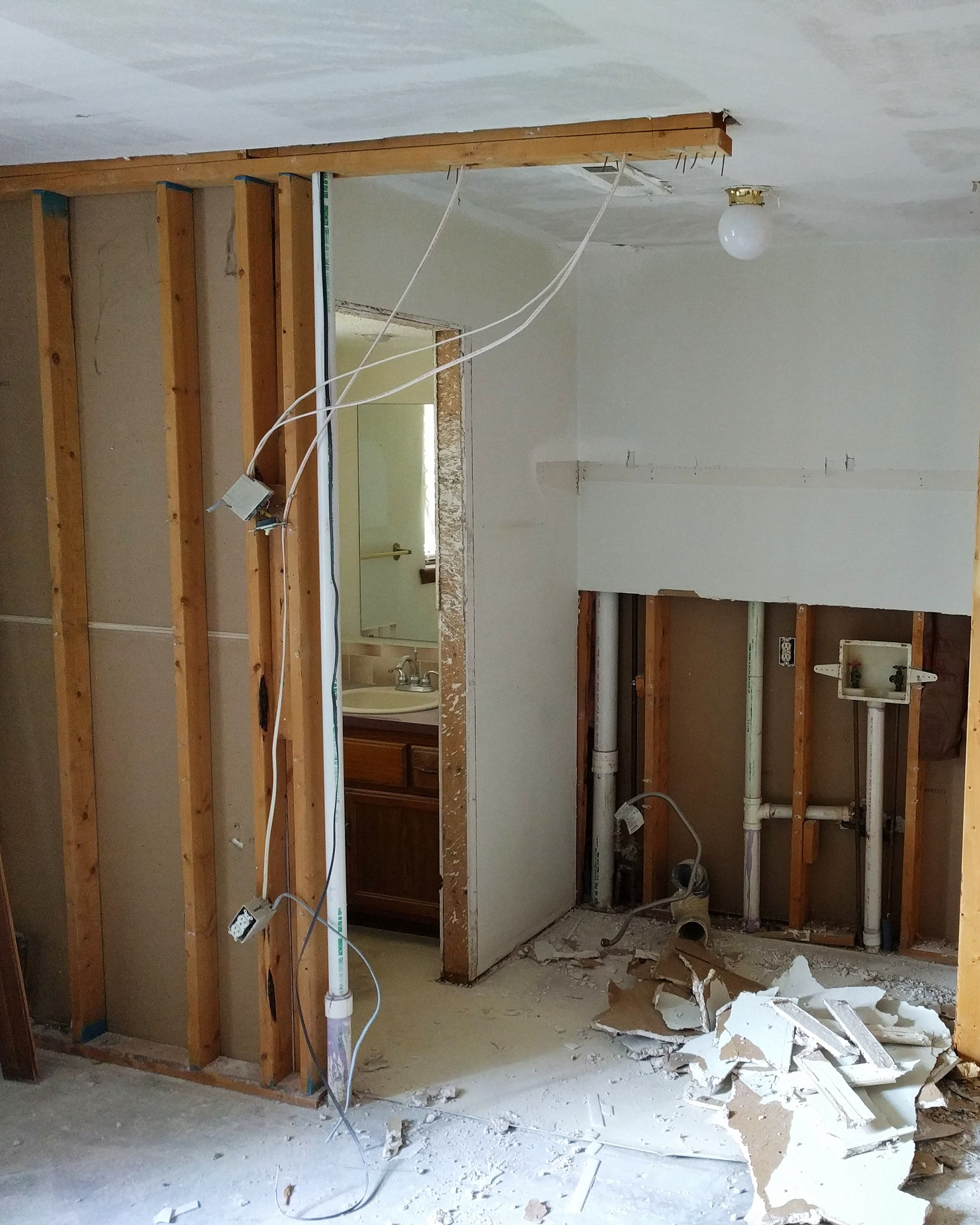 Demolition of old bathroom and laundry.