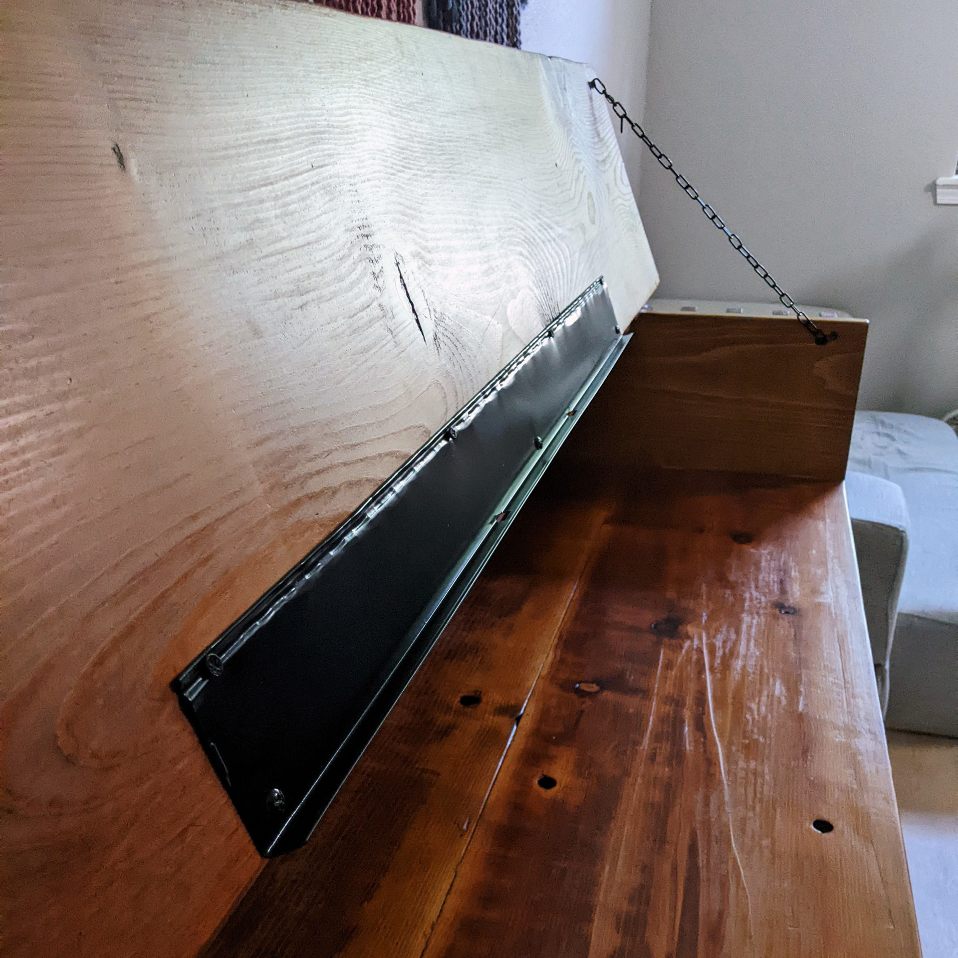Scrap metal painted black and used as music stand.