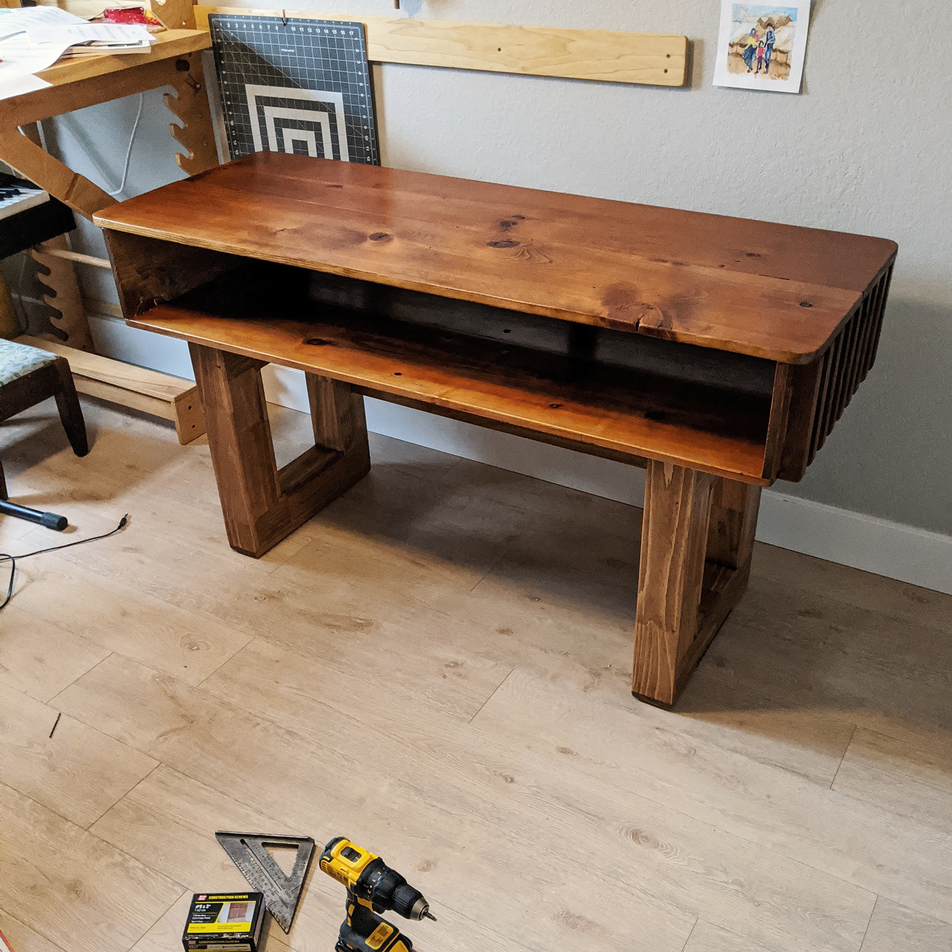 Everything stacked together. The top just sits on the legs and is secured with brackets.