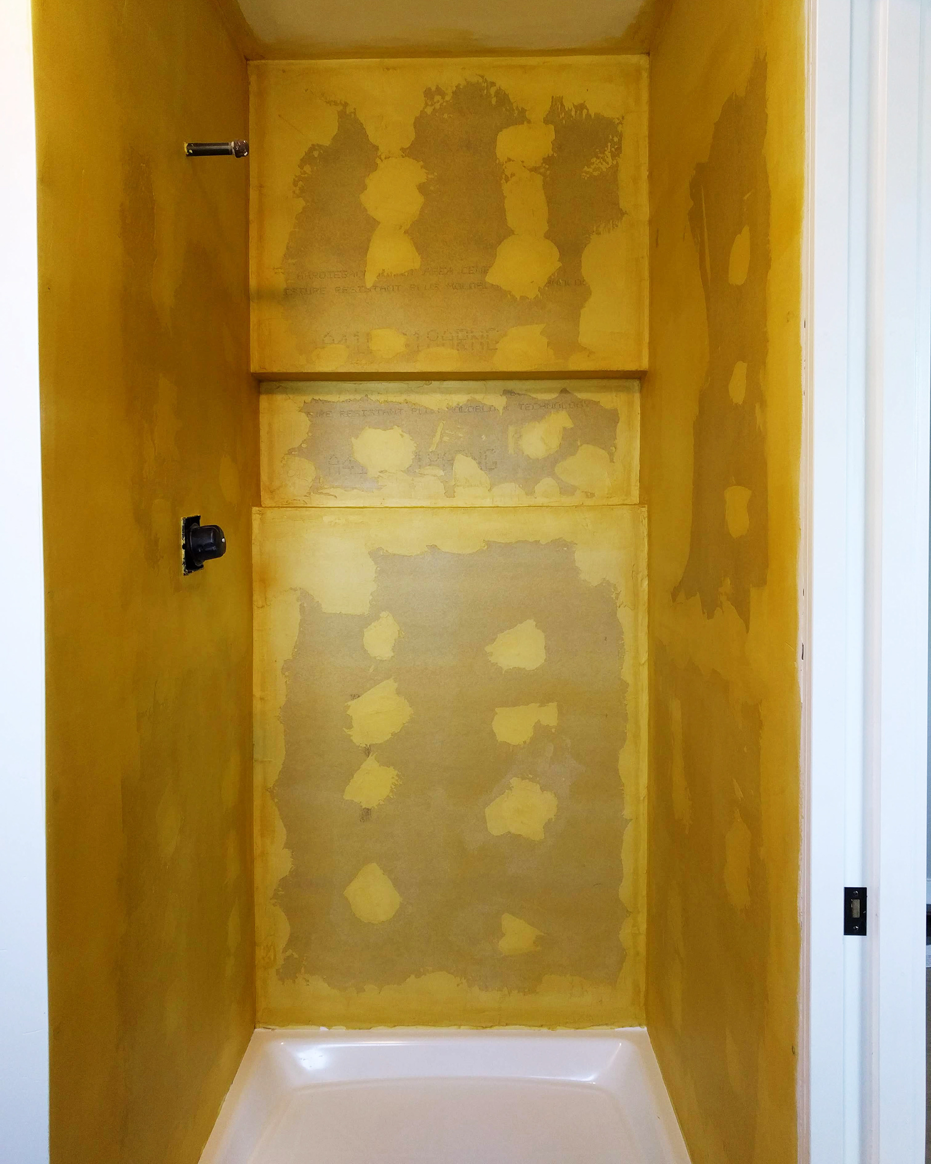 Sealing shower before tiling.