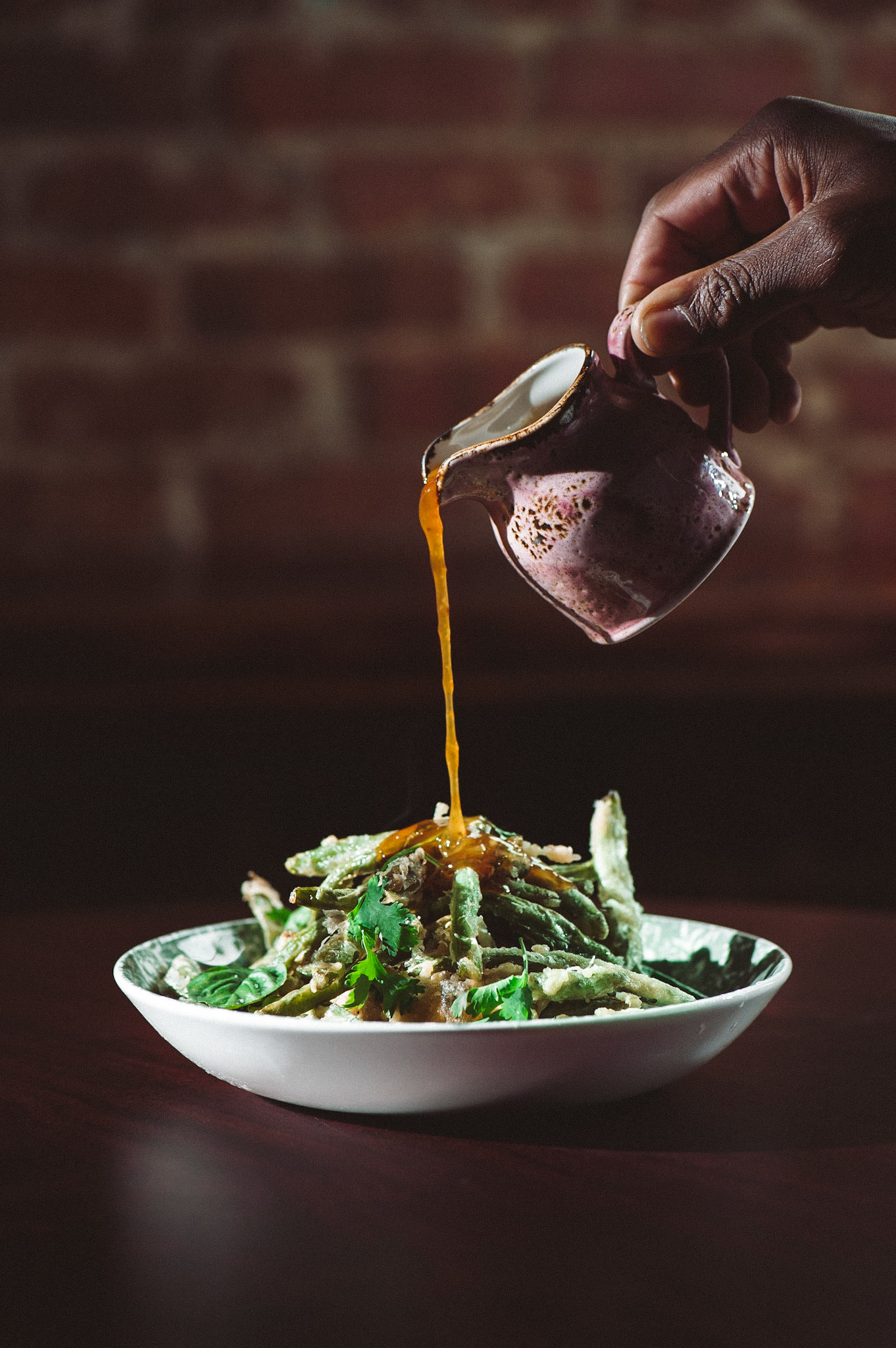 Southern Cooking, Global Flavors, a cookbook by Top Chef Kenny Gilbert with food photography by Kristen Penoyer. Launching May 2023. Produced in Jacksonville, Florida for Rizzoli Publishing.