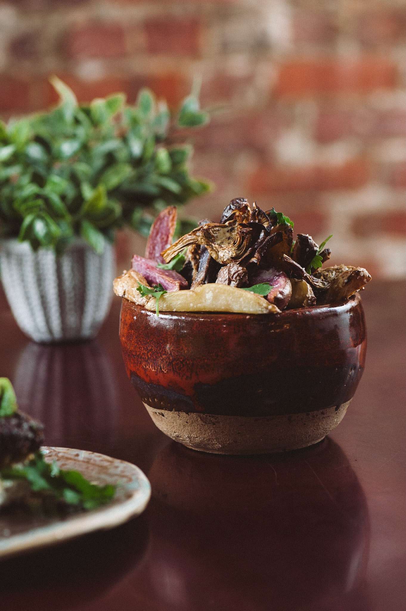 Southern Cooking, Global Flavors, a cookbook by Top Chef Kenny Gilbert with food photography by Kristen Penoyer. Launching May 2023. Produced in Jacksonville, Florida for Rizzoli Publishing.