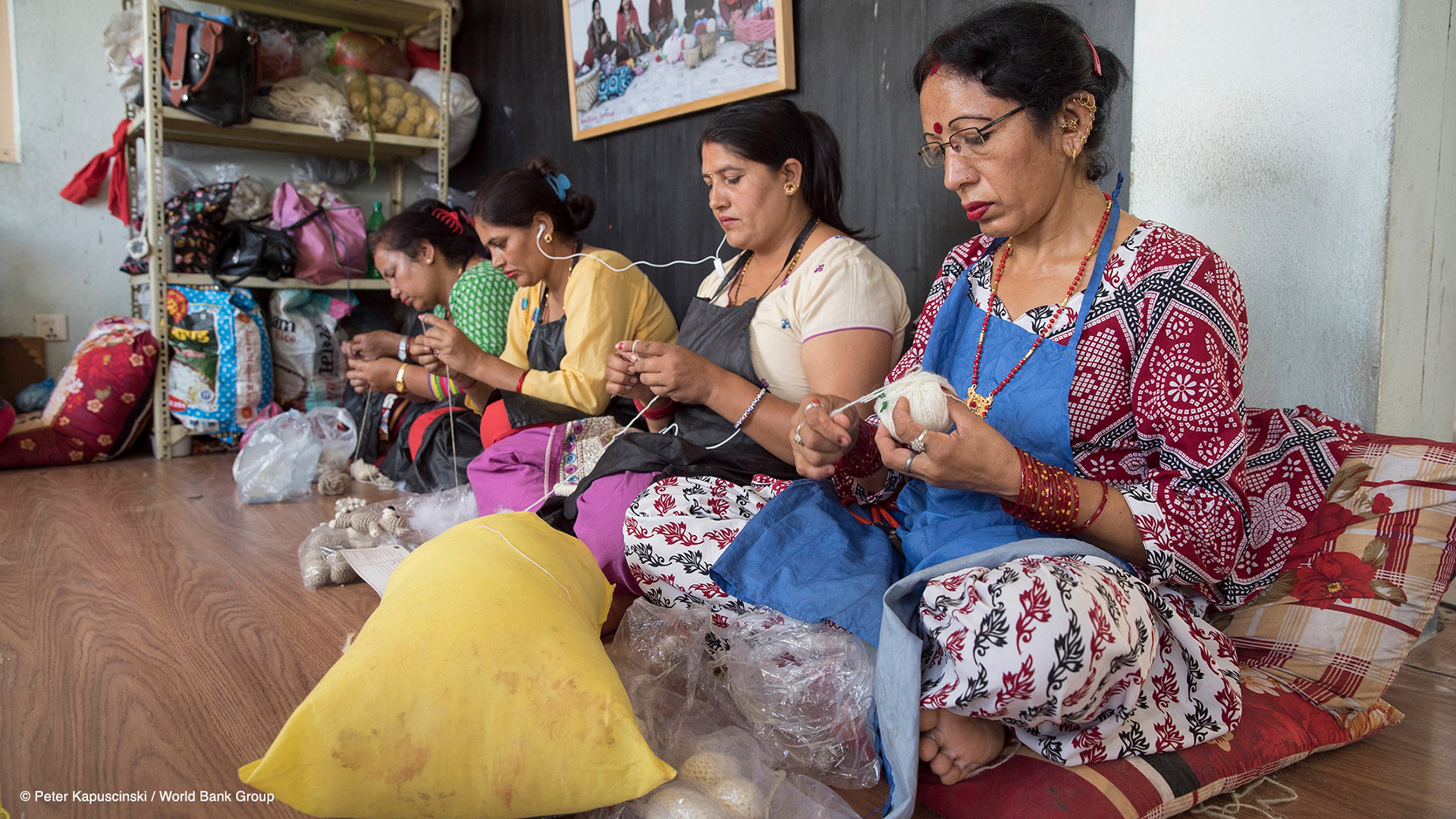 Women knit handicrafts for export at Everest Fashion Fair Craft in Lalitpur, Nepal. Photo: Peter Kapuscinski / World Bank