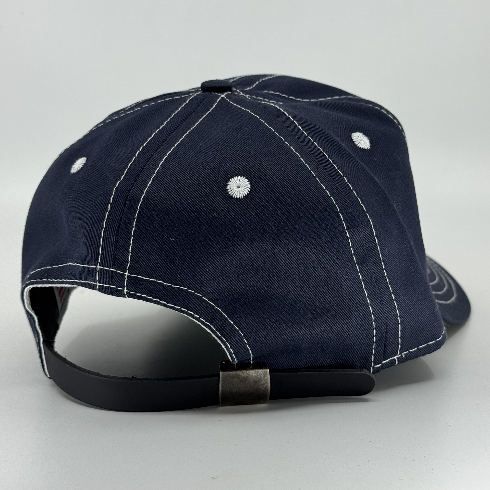 Navy Twill with contrast and black leather closure
